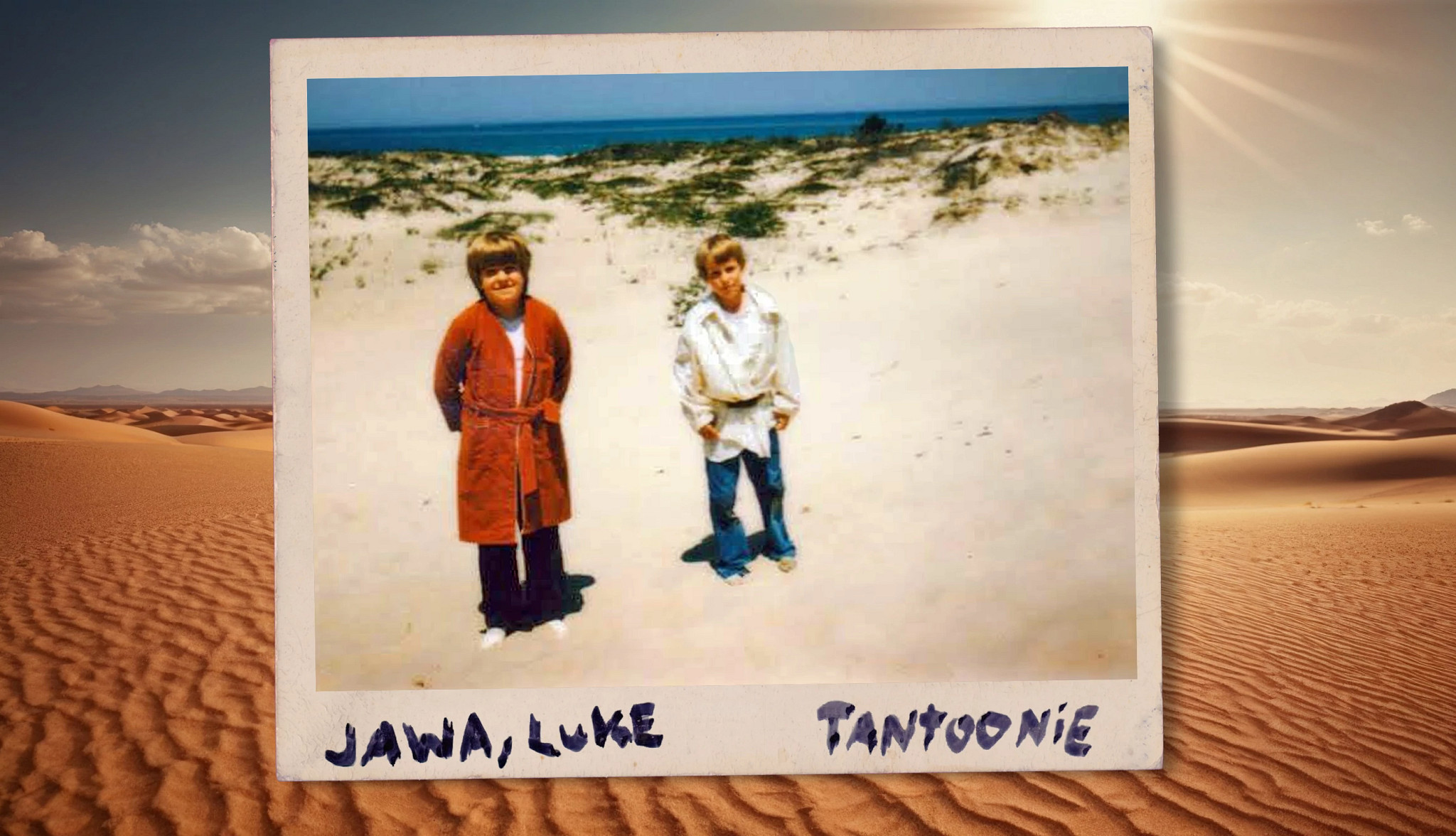 two children on a beach, wearing star wars-inspired outfits