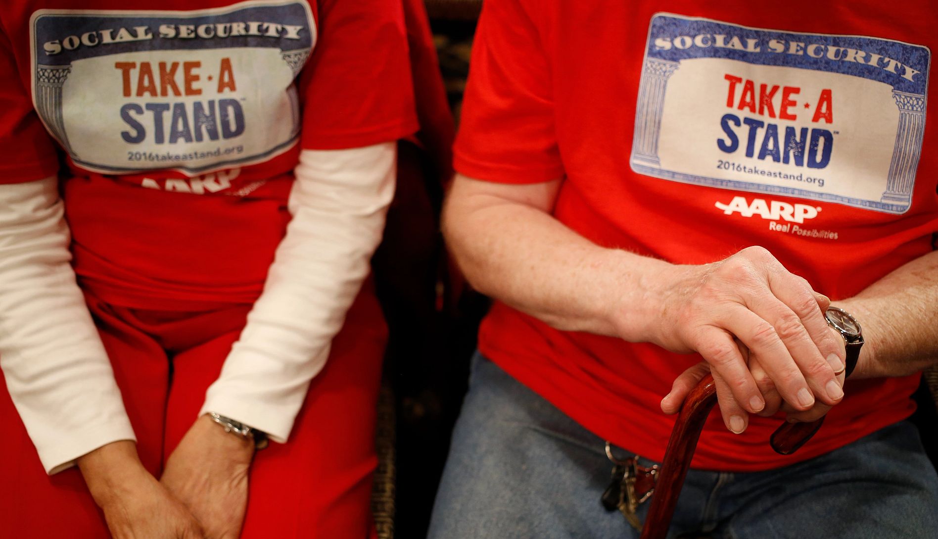 At These Key Moments, AARP Stood Up for Social Security people wearing red shirts with take a stand written on them