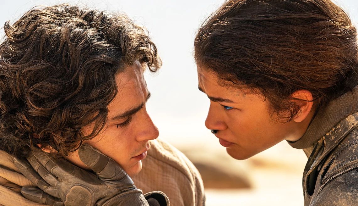 Timothée Chalamet and Zendaya looking into each other's eyes in "Dune: Part Two."
