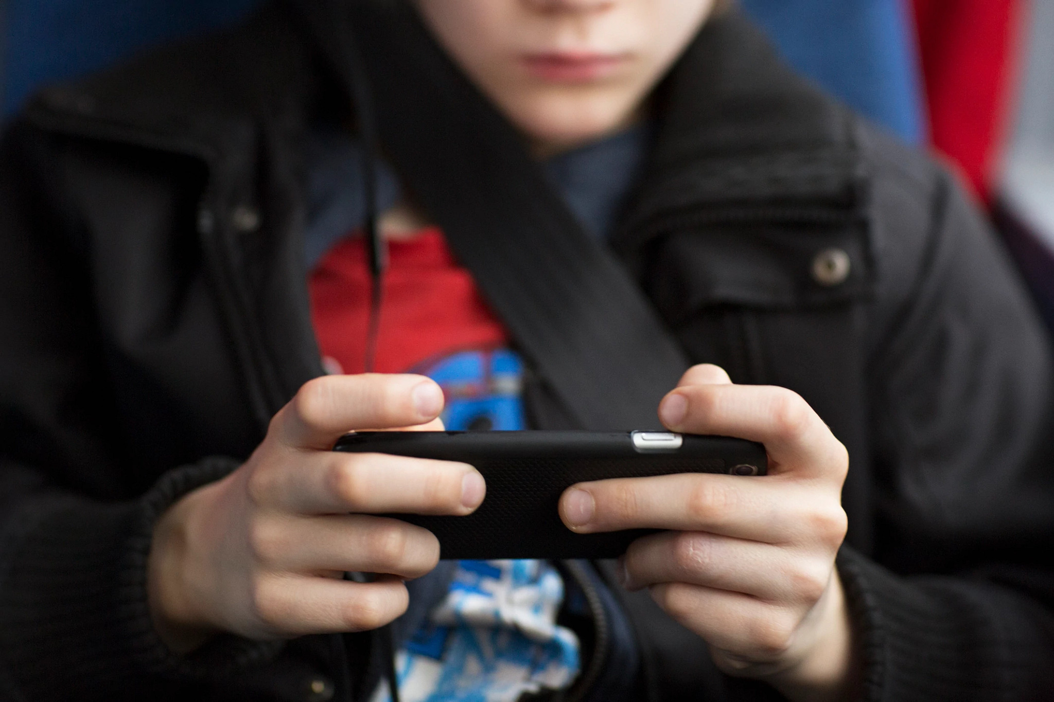 Boy on his cellphone