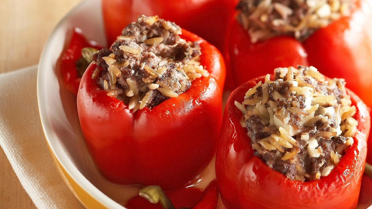 A close-up view of stuffed red peppers