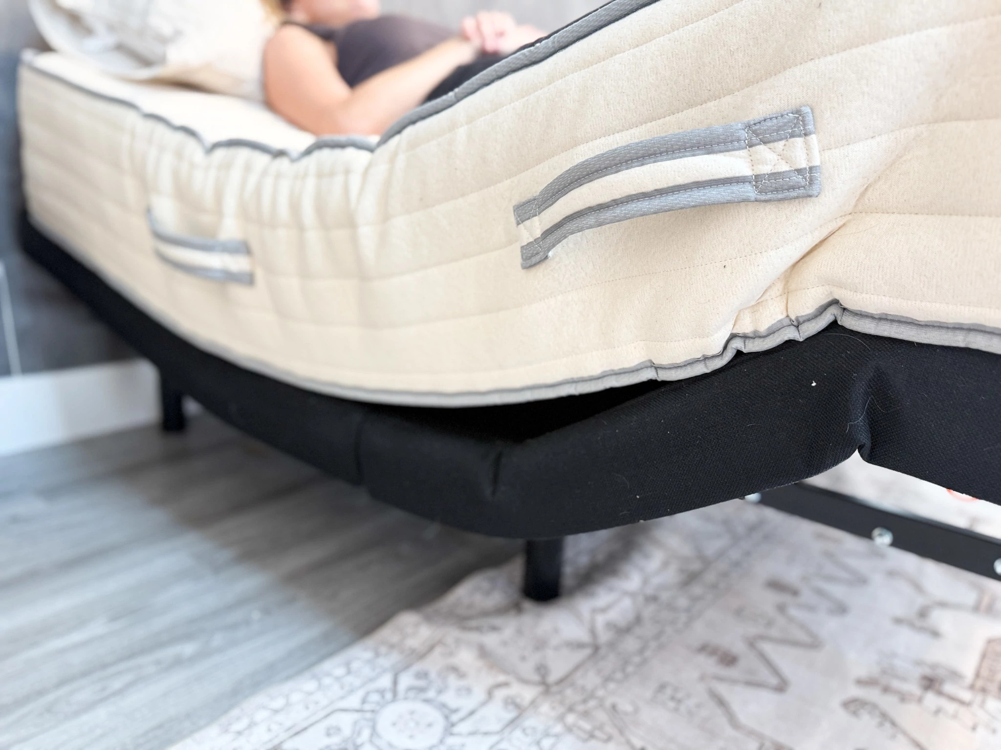 The Nolah Natural mattress conforming on an adjustable base in the zero-gravity position