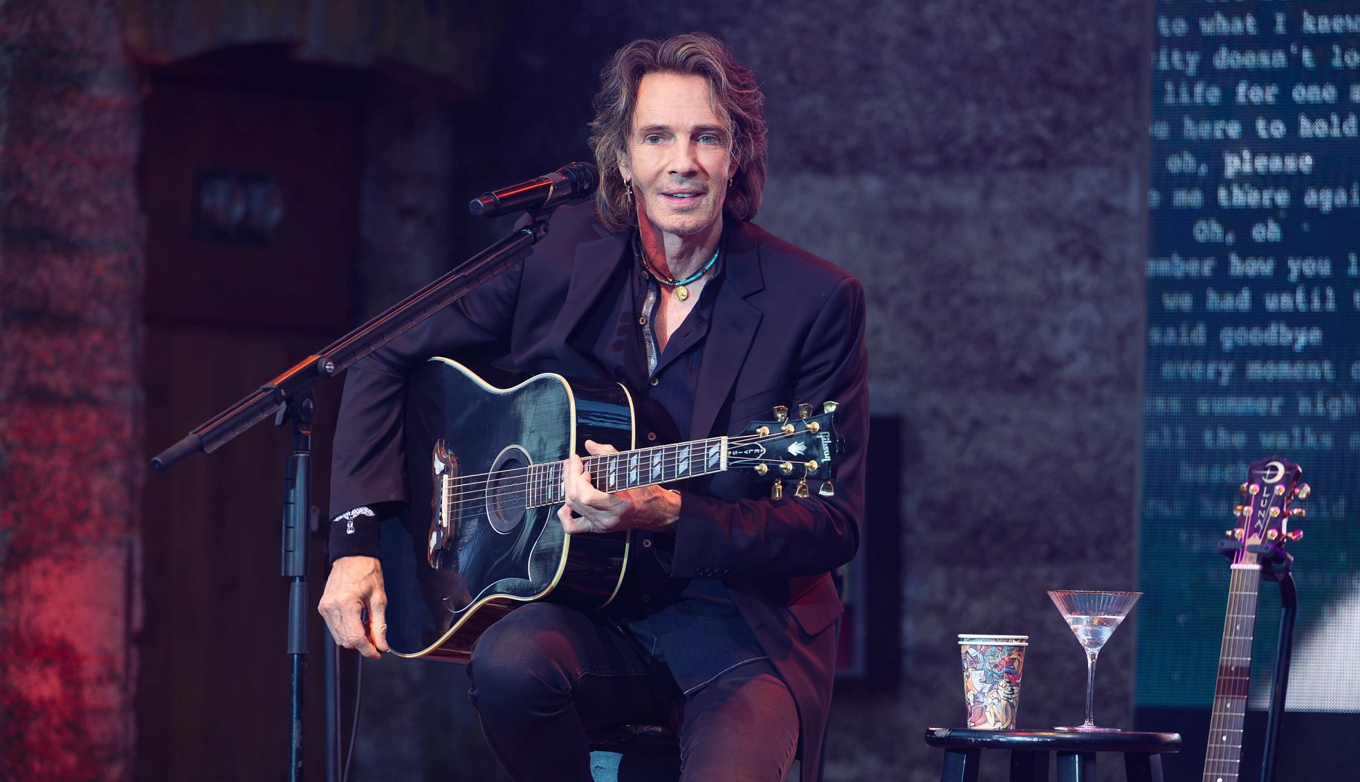 Rick Springfield and Dick Van Dyke Pump Iron rick springfield performing with a guitar