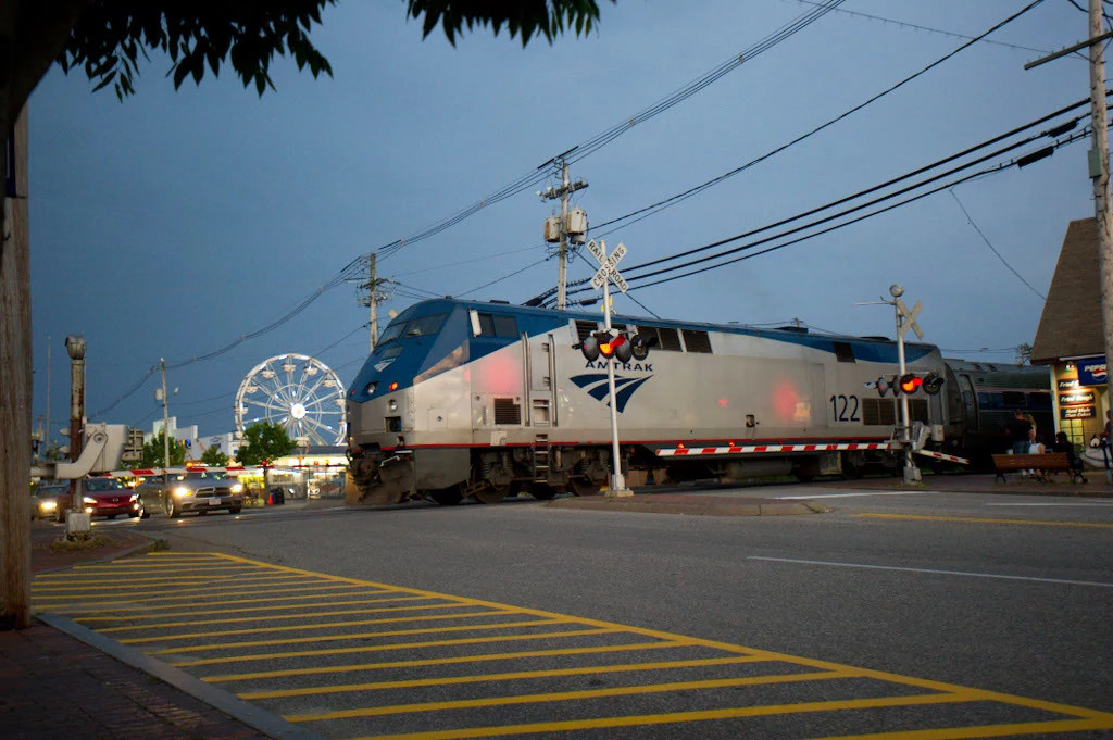 a train traveling near a street