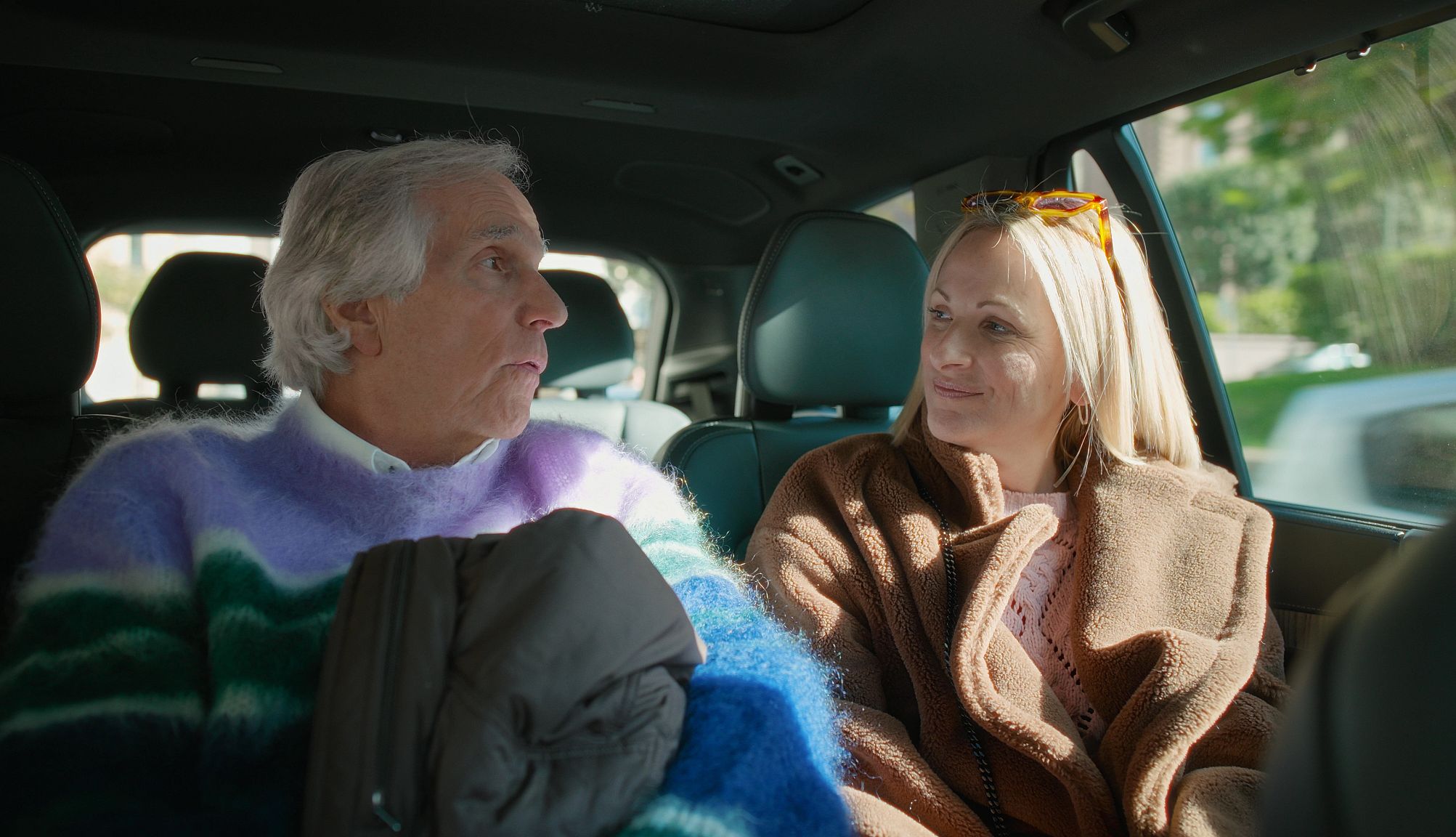Marlee Matlin Isn't Holding Back Henry Winkler and Marlee Matlin have a convesation inside a car.