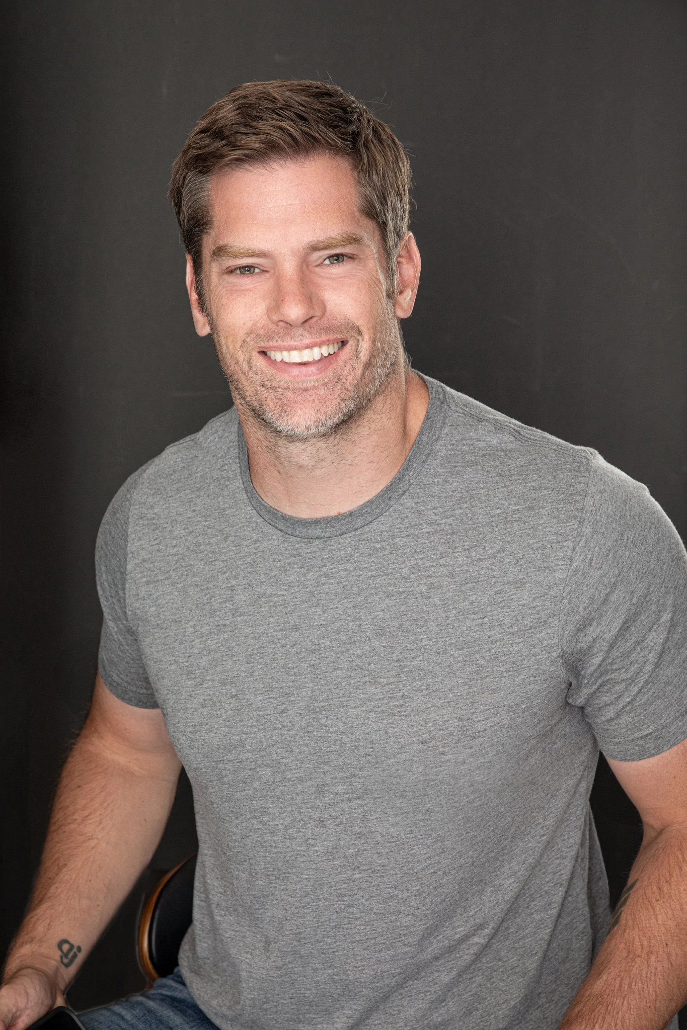 dallas jenkins smiling in a portrait