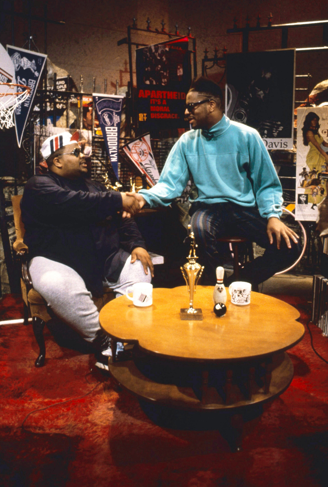 doctor dre and ed lover shaking hands in a scene from an episode yo m t v raps
