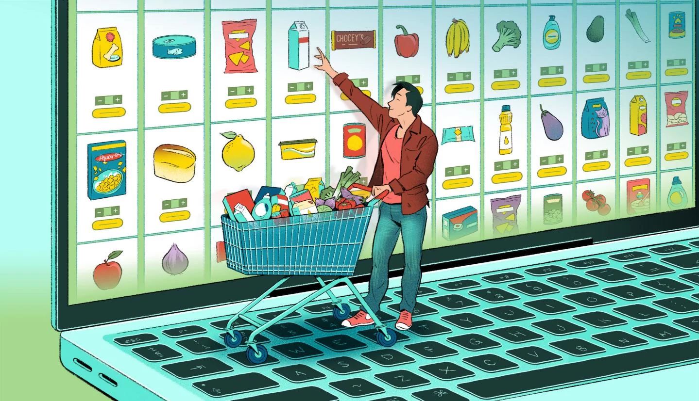 Online Grocery Shopping Tips a person pushing a shopping cart stands on a giant laptop with grocery items on the screen