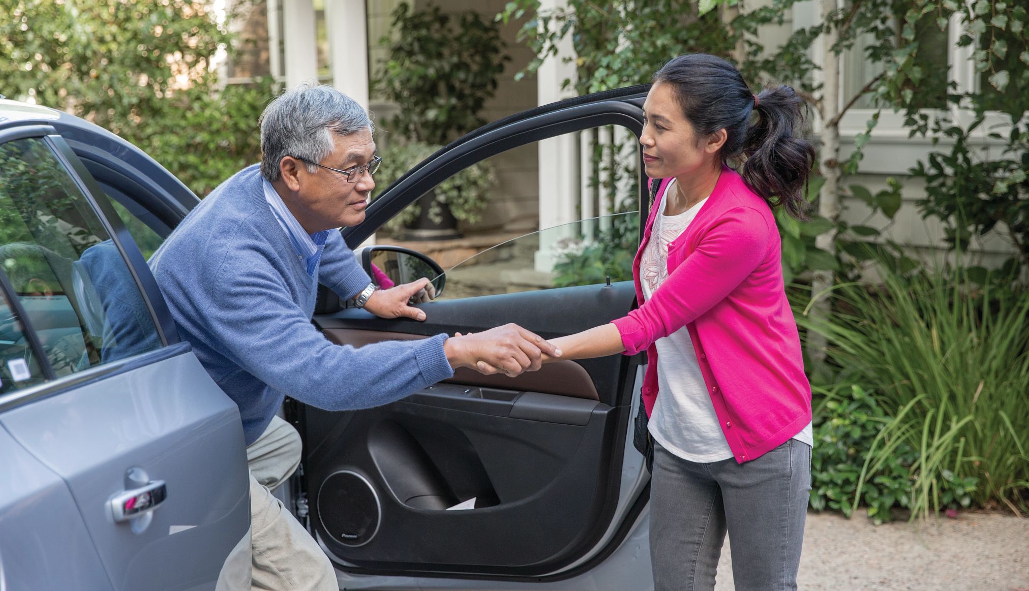 How to get paid to care for family a woman helps a man out of a car
