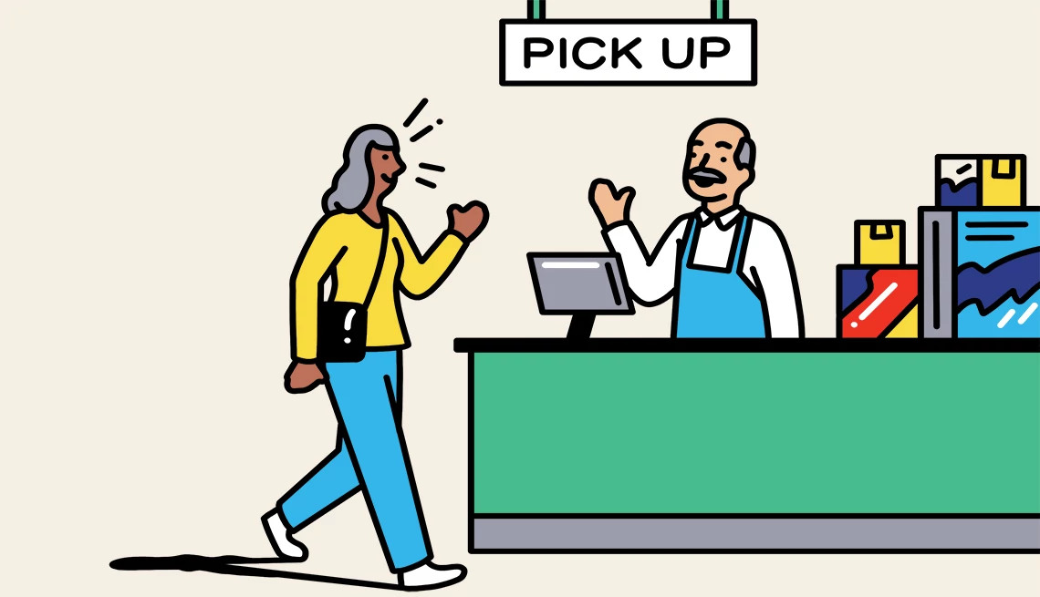 a woman walks toward a pick up sign in a store counter. a worker stands behind the counter