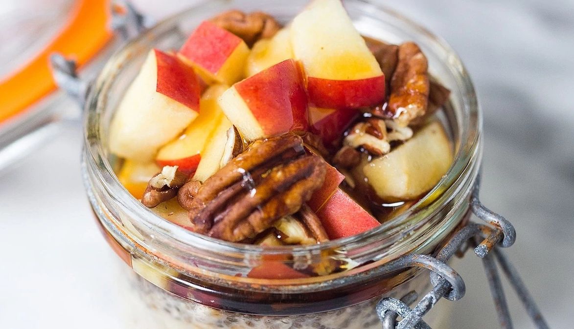 Apple-cinnamon overnight oats A close-up view of apple-cinnamon overnight oats in a glass