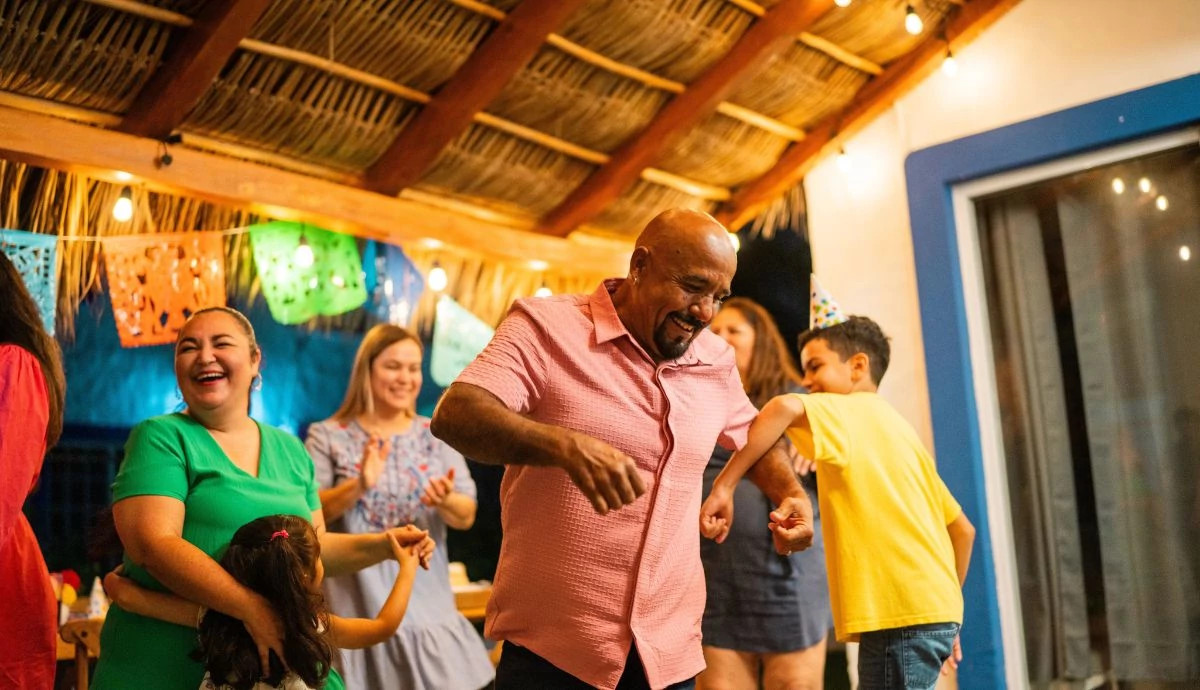father and son dancing
