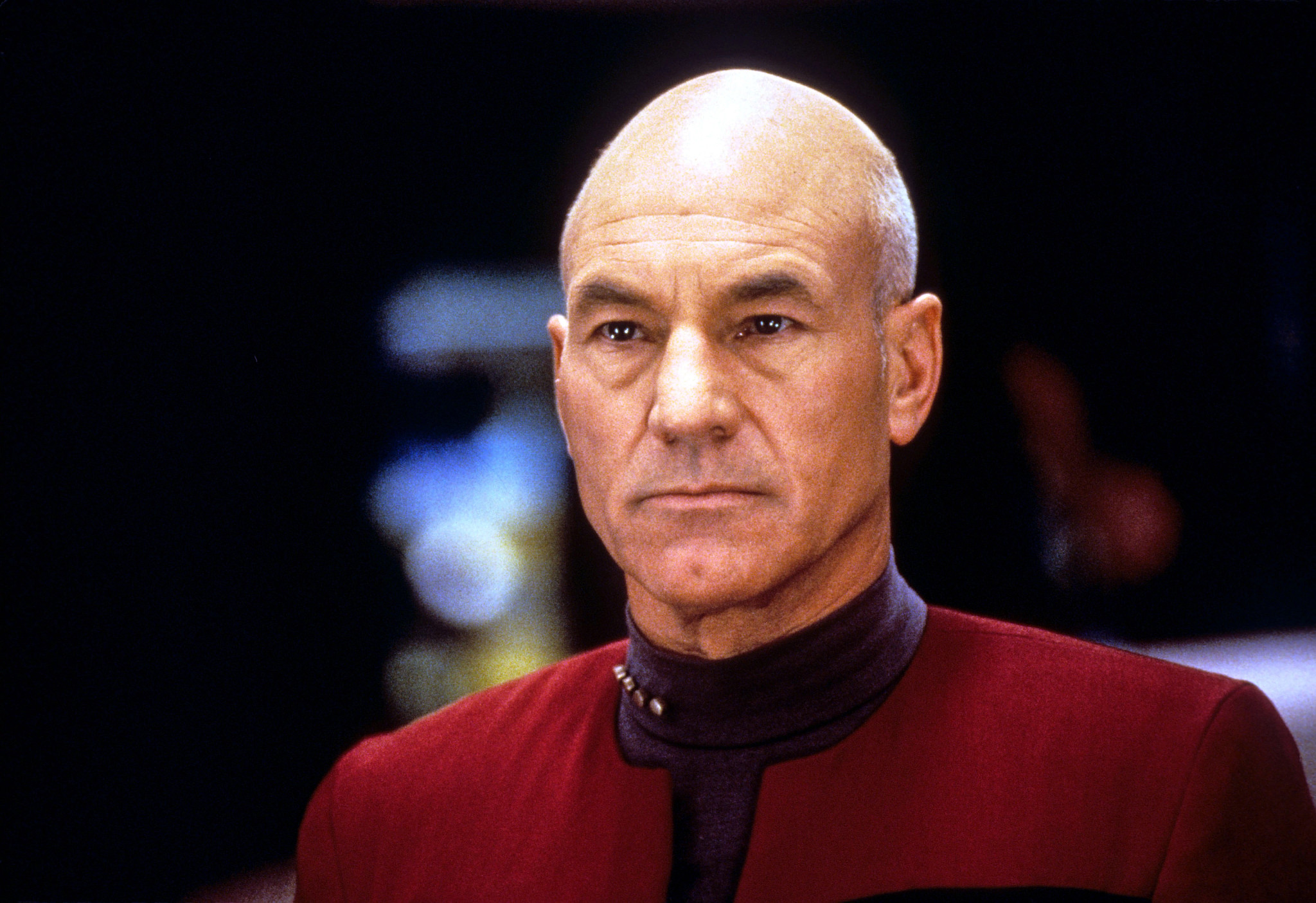 a head shot of patrick stewart as capt. jean-luc picard in star trek: the next generation