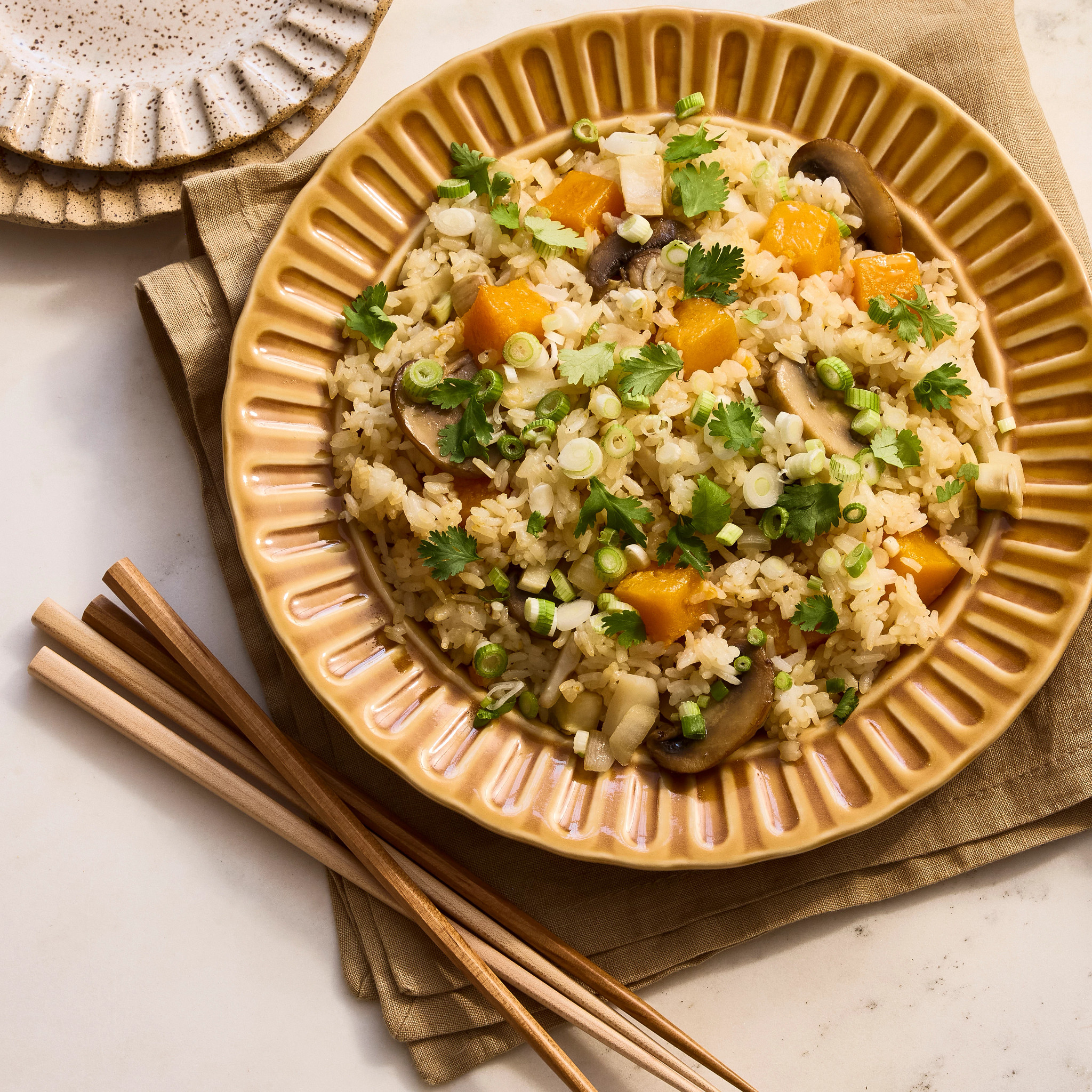 a photo shows sticky rice stuffing with pumpkin and chestnuts
