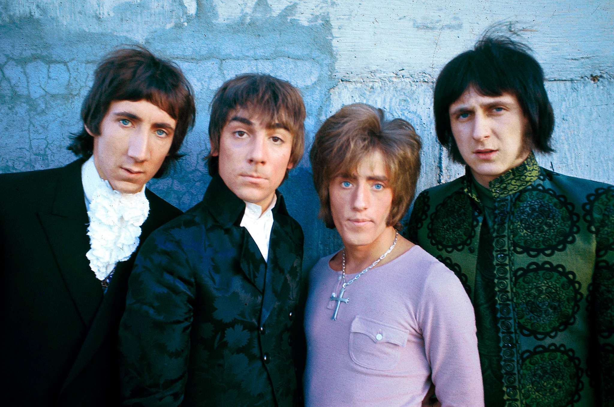 Pete Townshend, Keith Moon, Roger Daltrey and John Entwistle posing together for a group photo