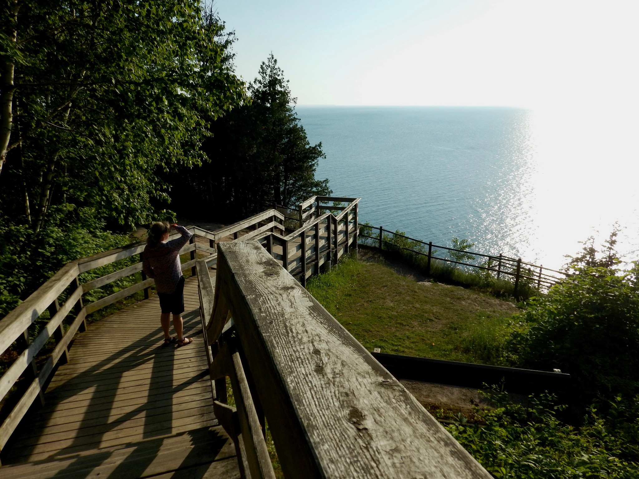 a person walking along a boardwalk in Ellison Bay, Wisconsin.