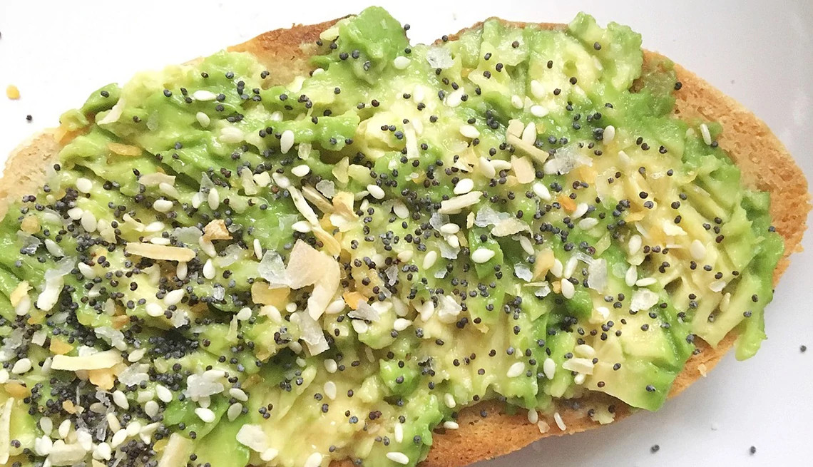 A close-up view of an everything bagel avocado toast