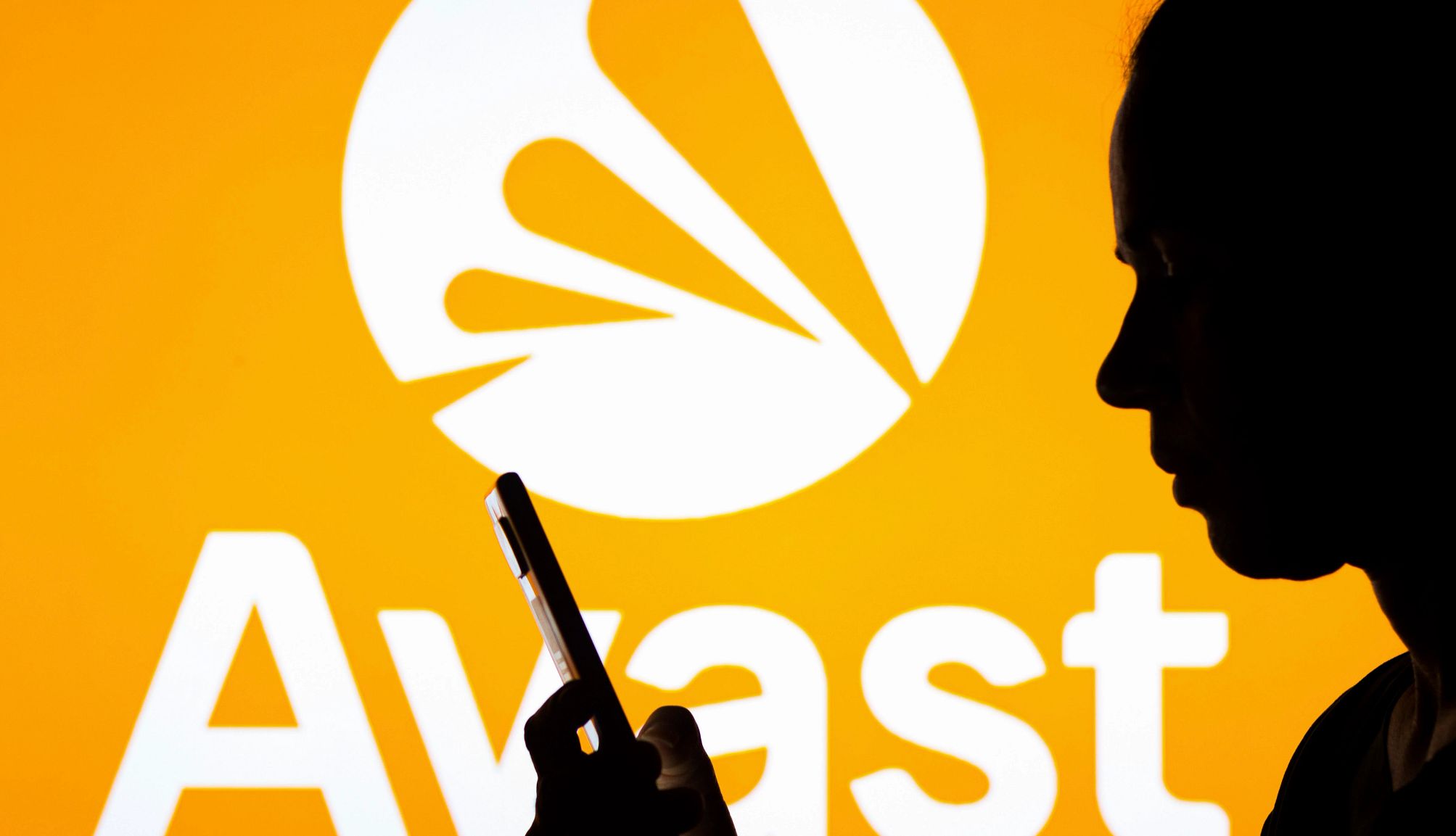 Antivirus Software Maker Fined $16.5M, Sold User Data a shadow of a man in front of a yellow company logo