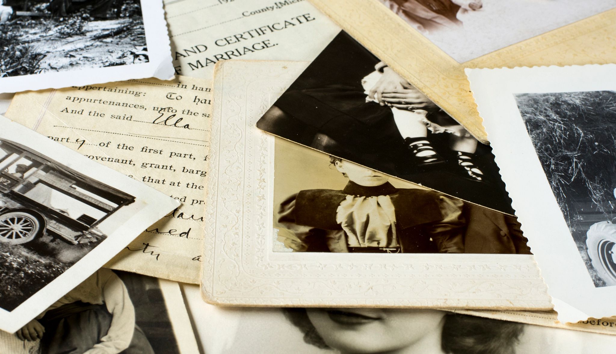 Genealogy family history theme with old family photos and documents Genealogy family history theme with old family photos and documents