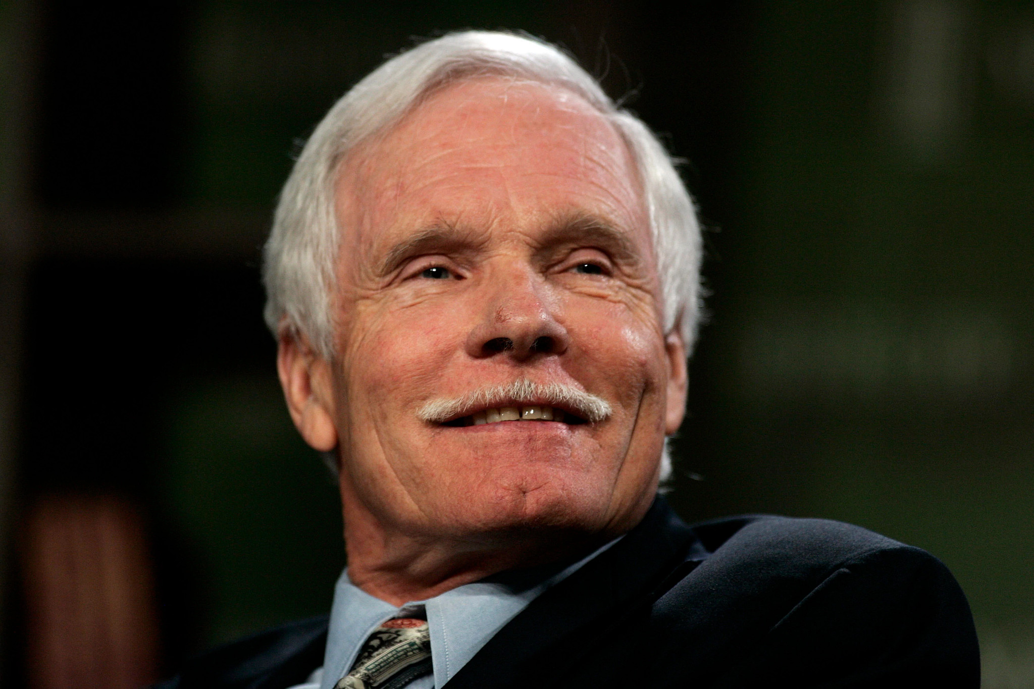 ted turner head shot on a black background