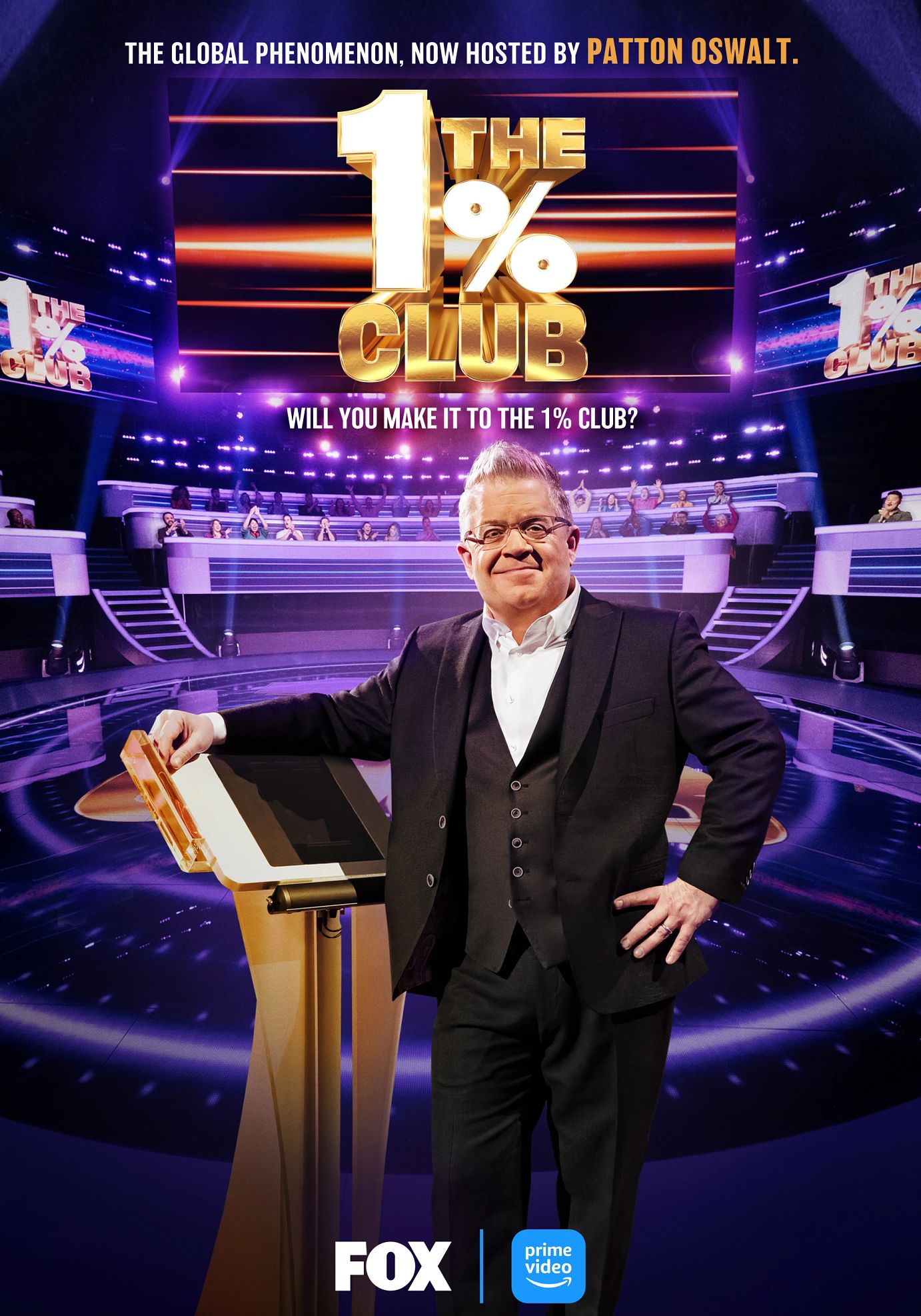 Patton Oswalt is the host of game show "The 1% Club" Patton Oswalt leaning against podium, group of people sitting behind him, the words The 1 percent club, will you make it to the 1 percent club are above him