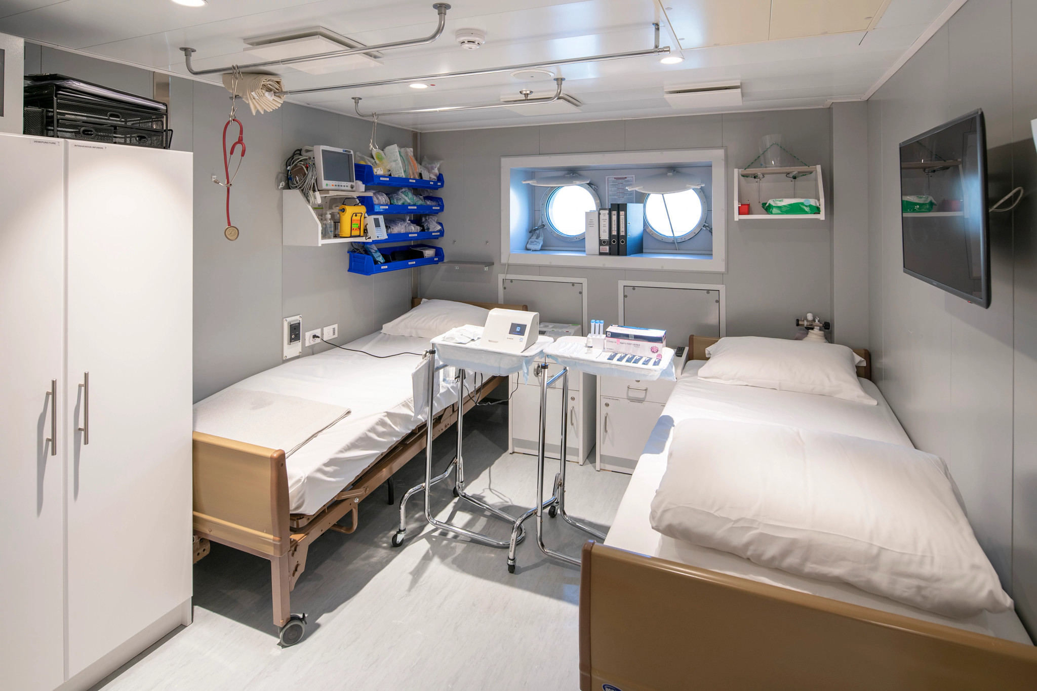 a medical room with two beds