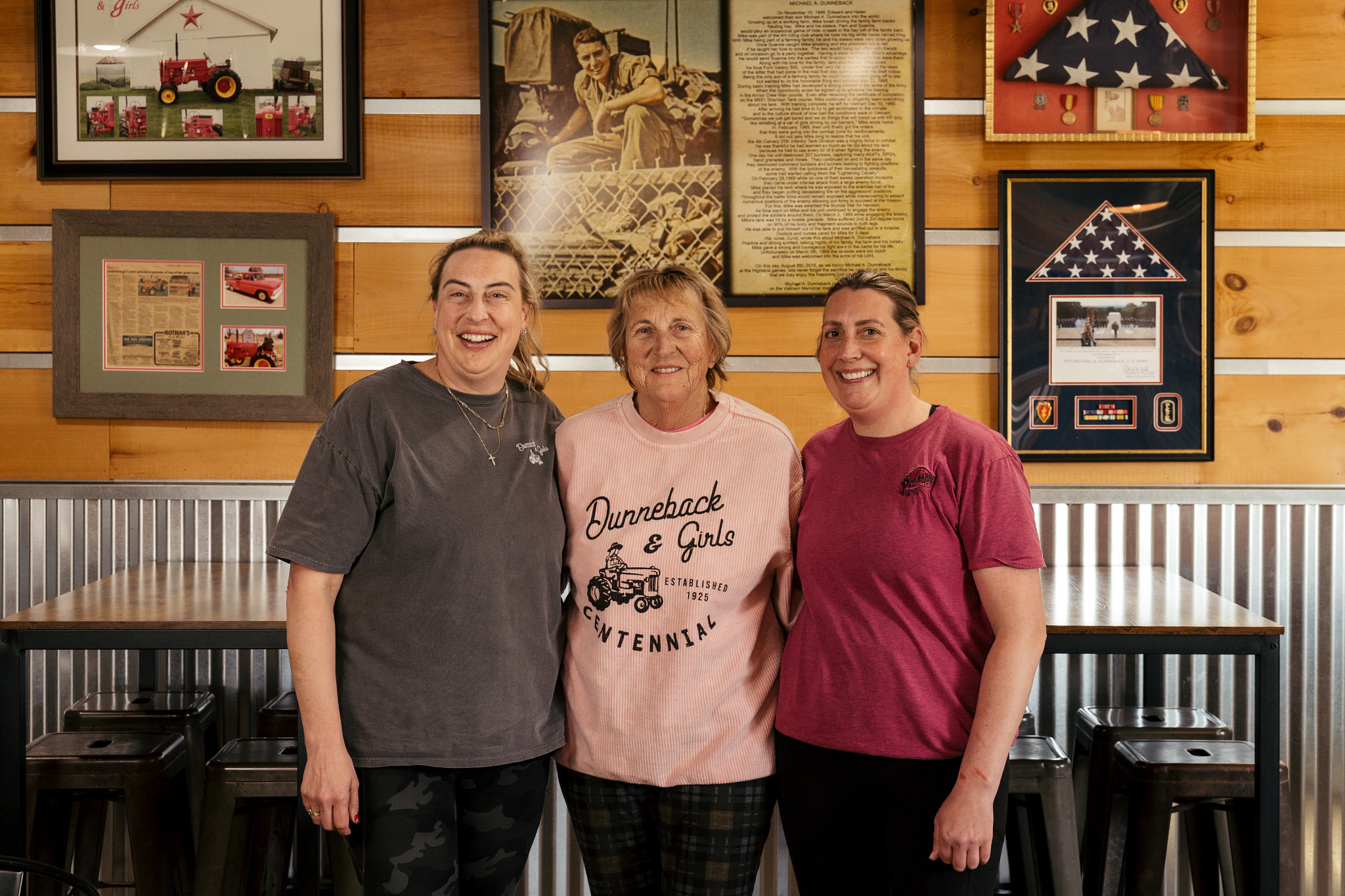a photo shows Stephanie Ginsberg, Suanne Shoemaker and Sara Stoddard at Ed Dunneback & Girls Farm in Michigan