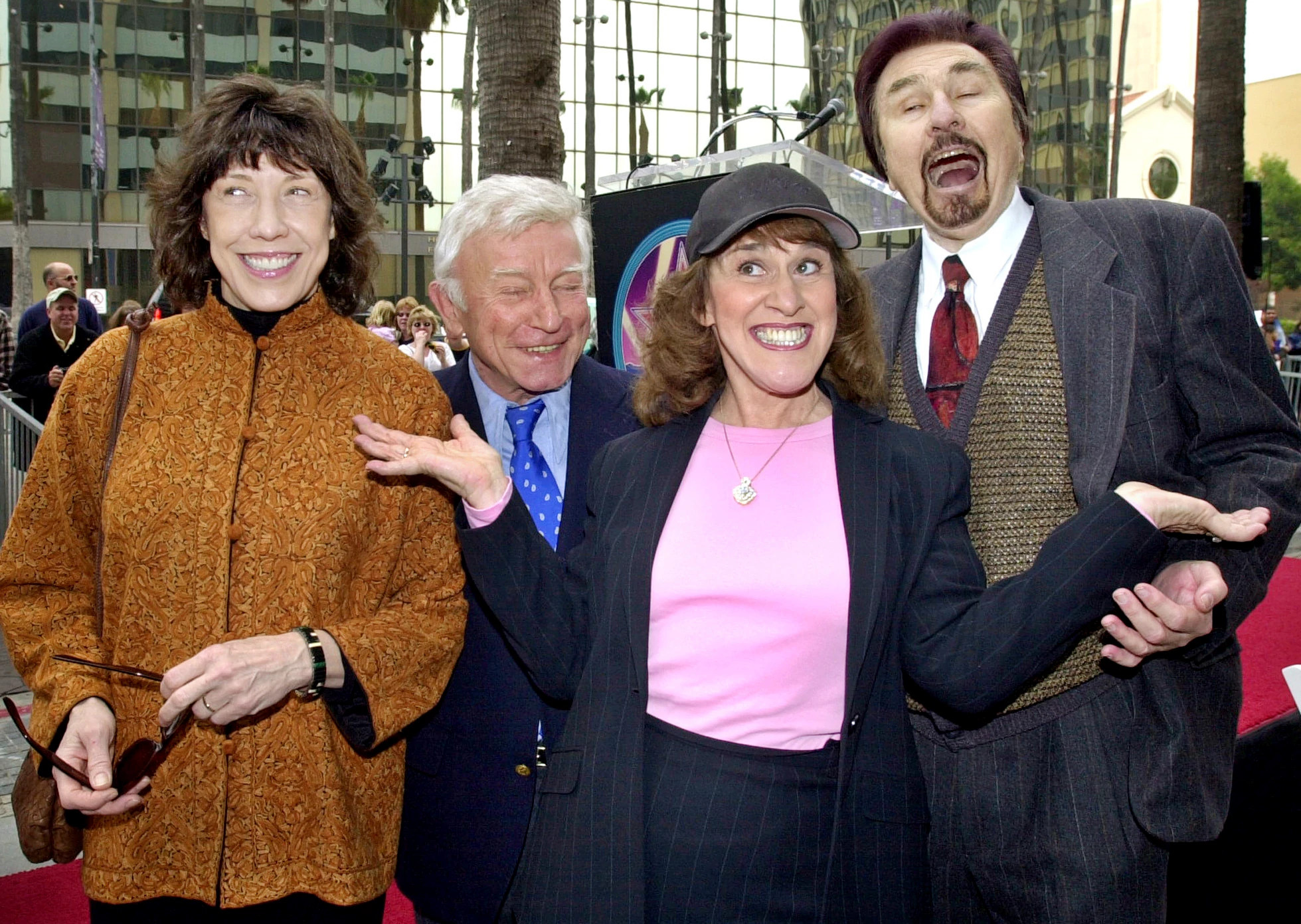'Laugh-In' cast members posing for a group photo