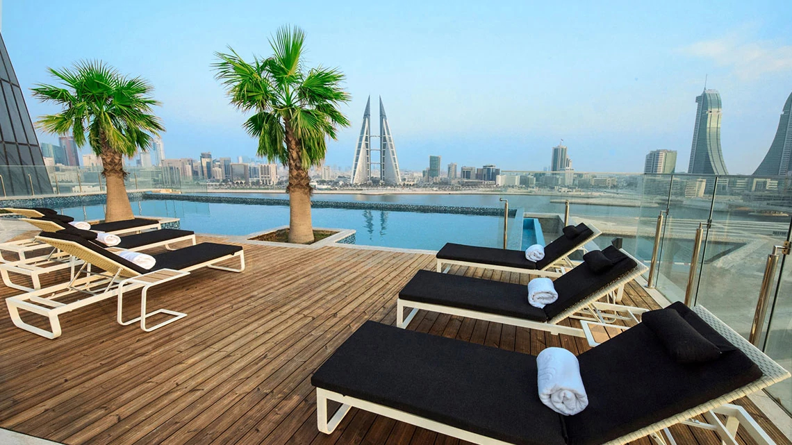Wyndham Grand® Poolside view overlooking infinity pool at Grand hotel property