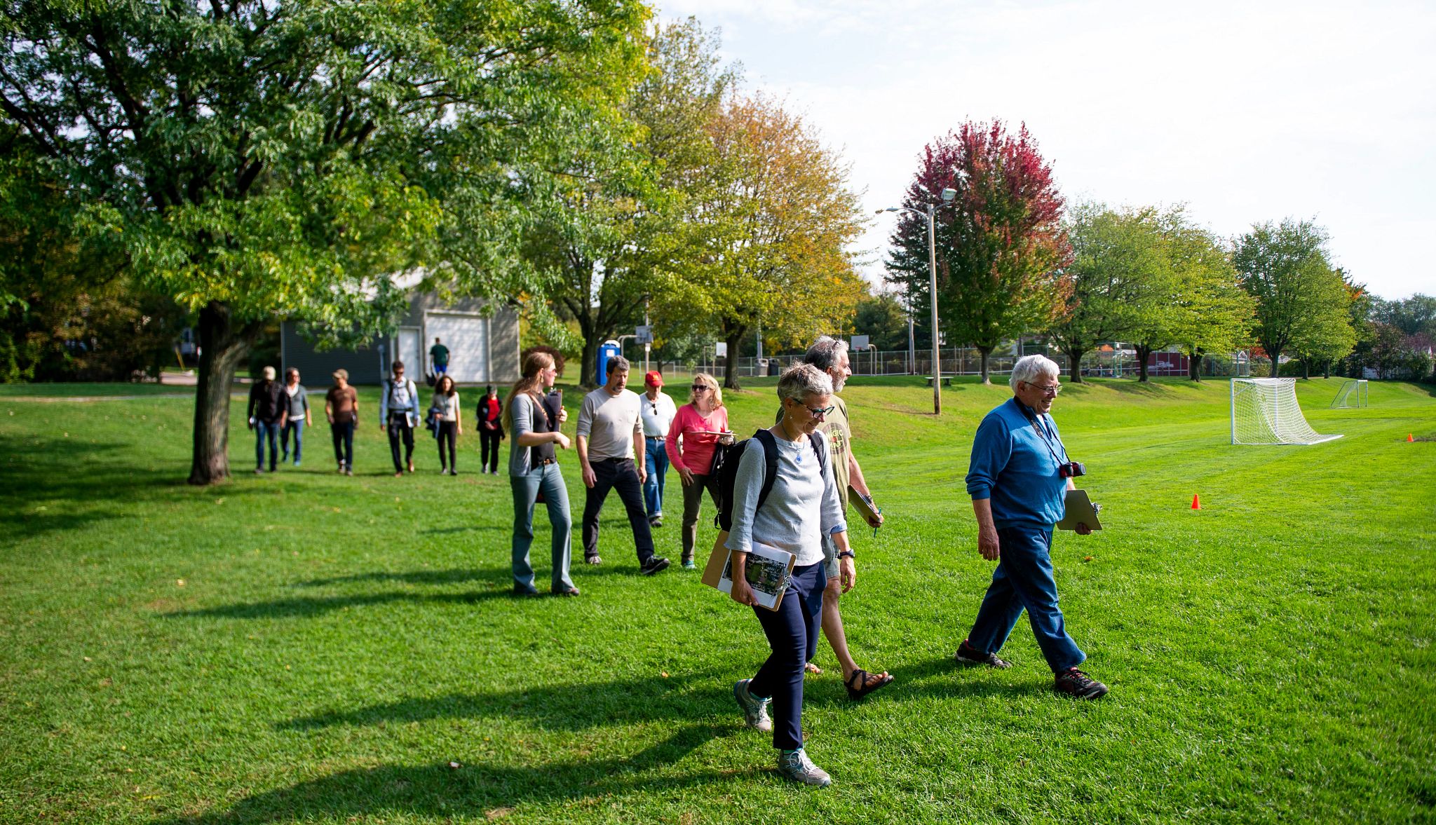 A group of staff, volunteers and officials conduct an evaluation of a city park to assess accessibility and usage for older residents in Calahan Park, Burlington, VT A group of staff, volunteers and officials conduct an evaluation of a city park to assess accessibility and usage for older residents in Calahan Park, Burlington, VT