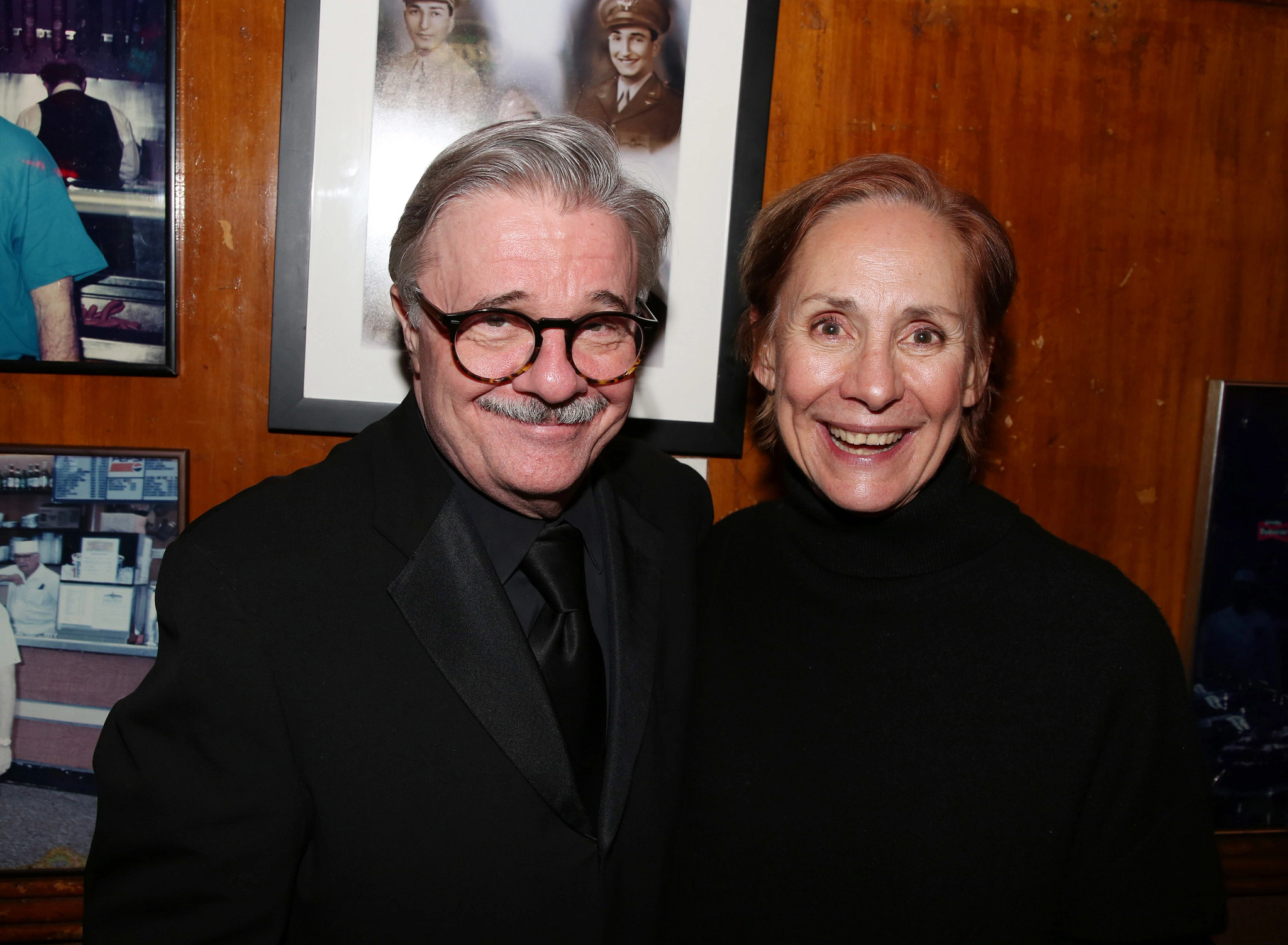 nathan lane and laurie metcalf posing together