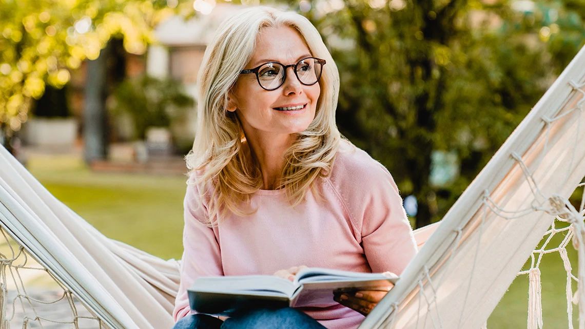 Senior woman reading a book