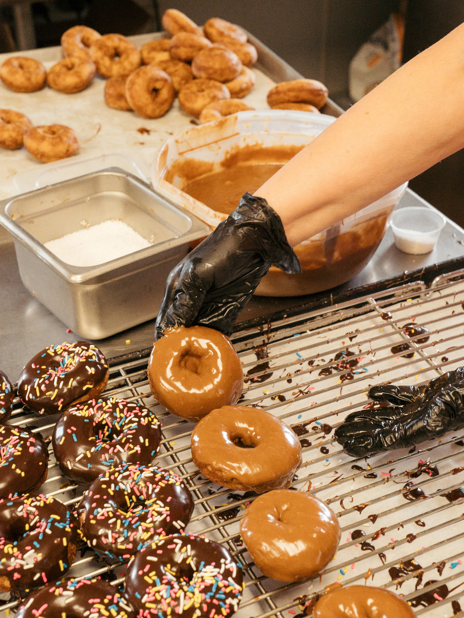 a person gazing donuts
