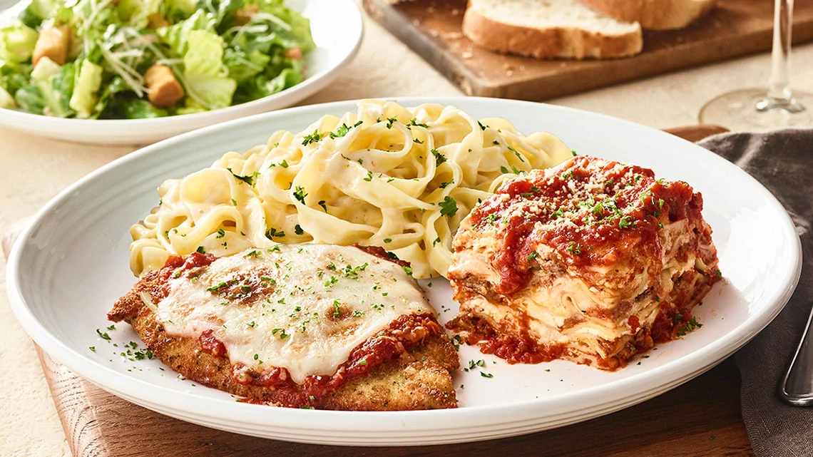 Carrabba's Italian Grill Restaurant chicken parmesan lasagna fettucine alfredo caeser salad bread wine