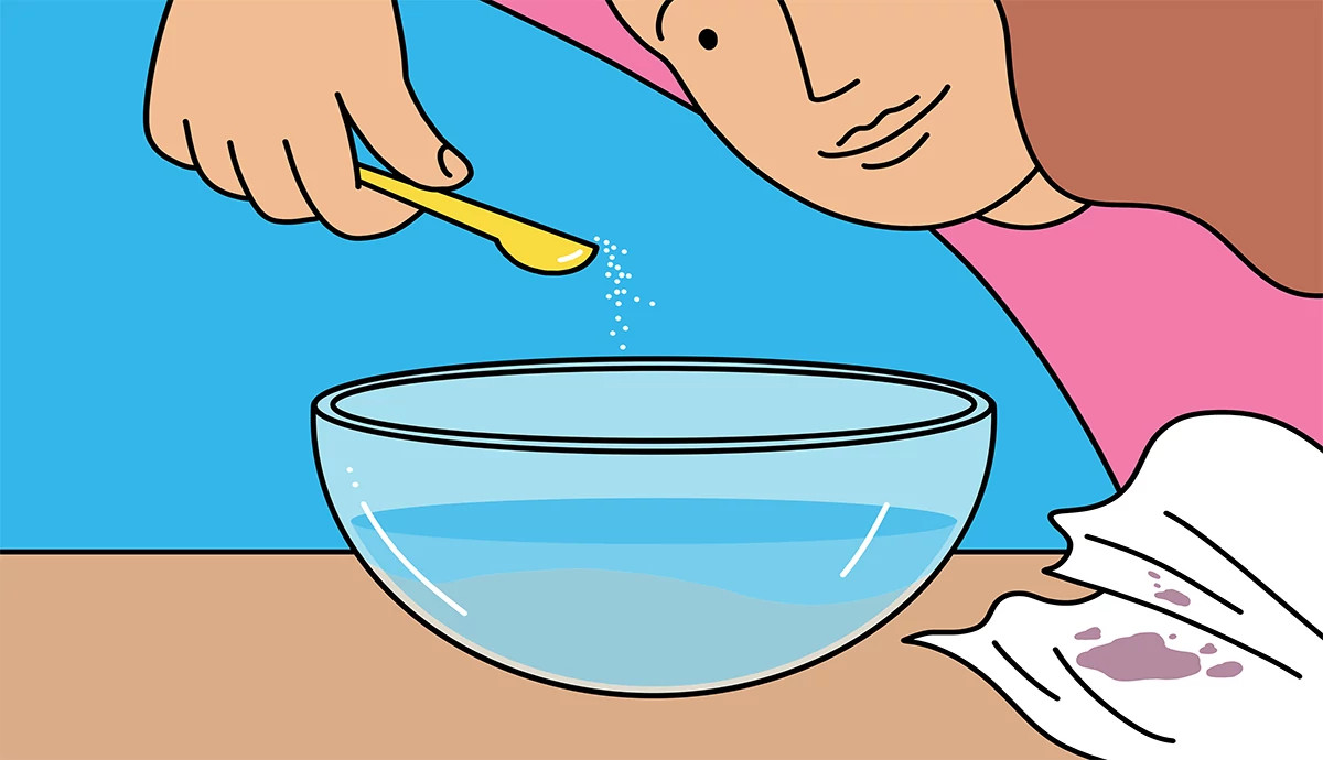 an illustration shows a woman adding oxygen bleach to a bowl of water