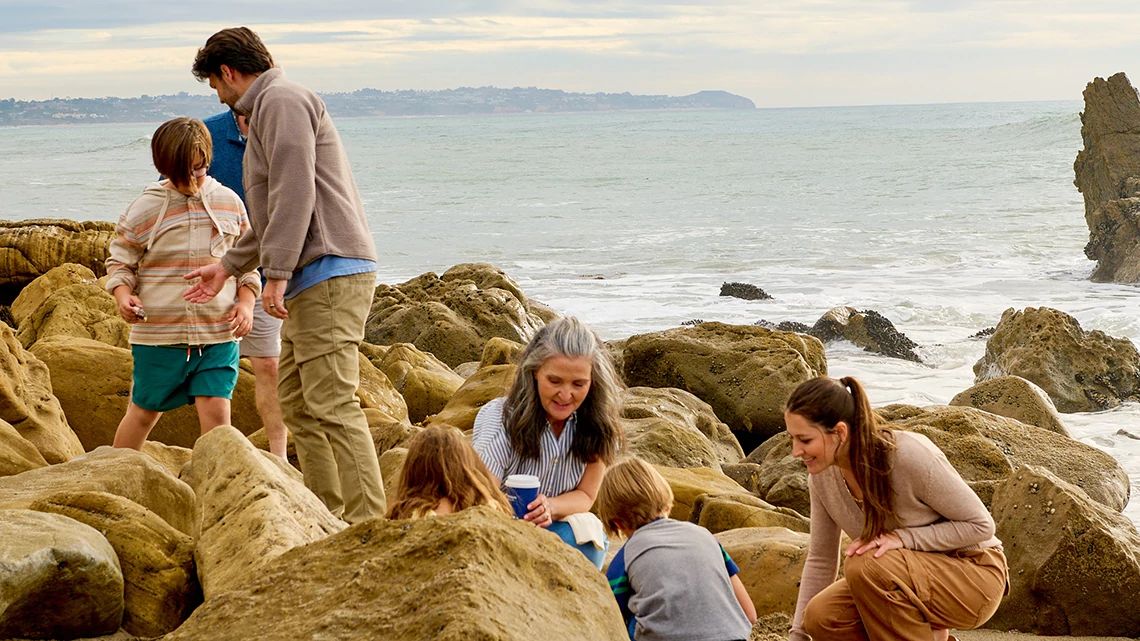 Family playing by the beach