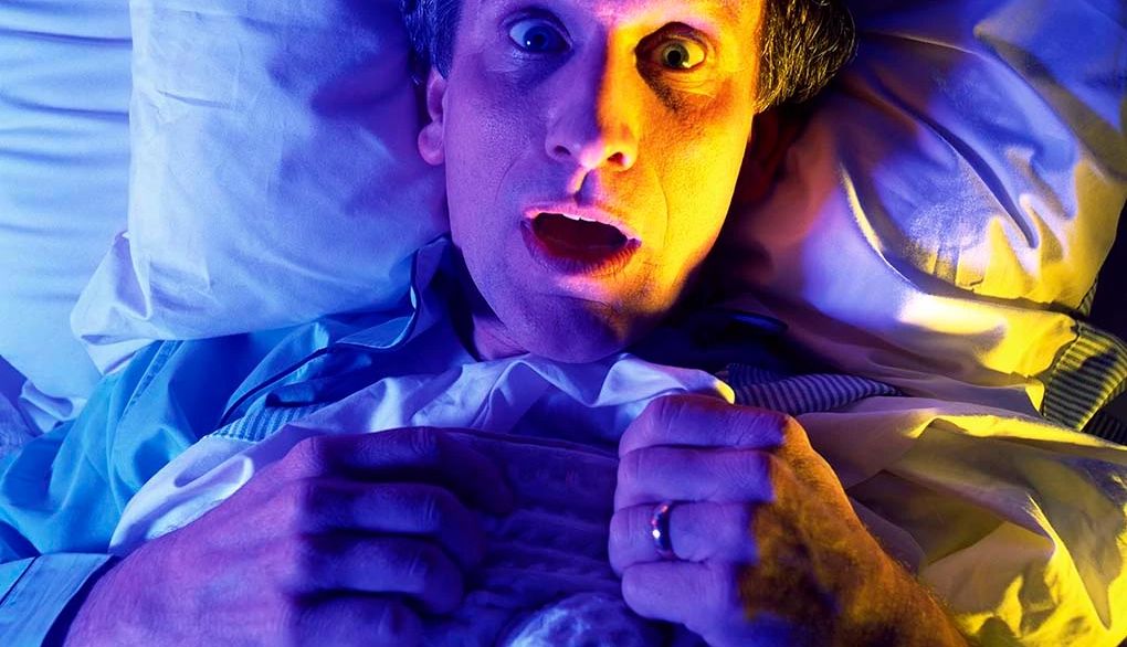 Artificial light at night could harm your sleep A man lying wide eyed in a bed