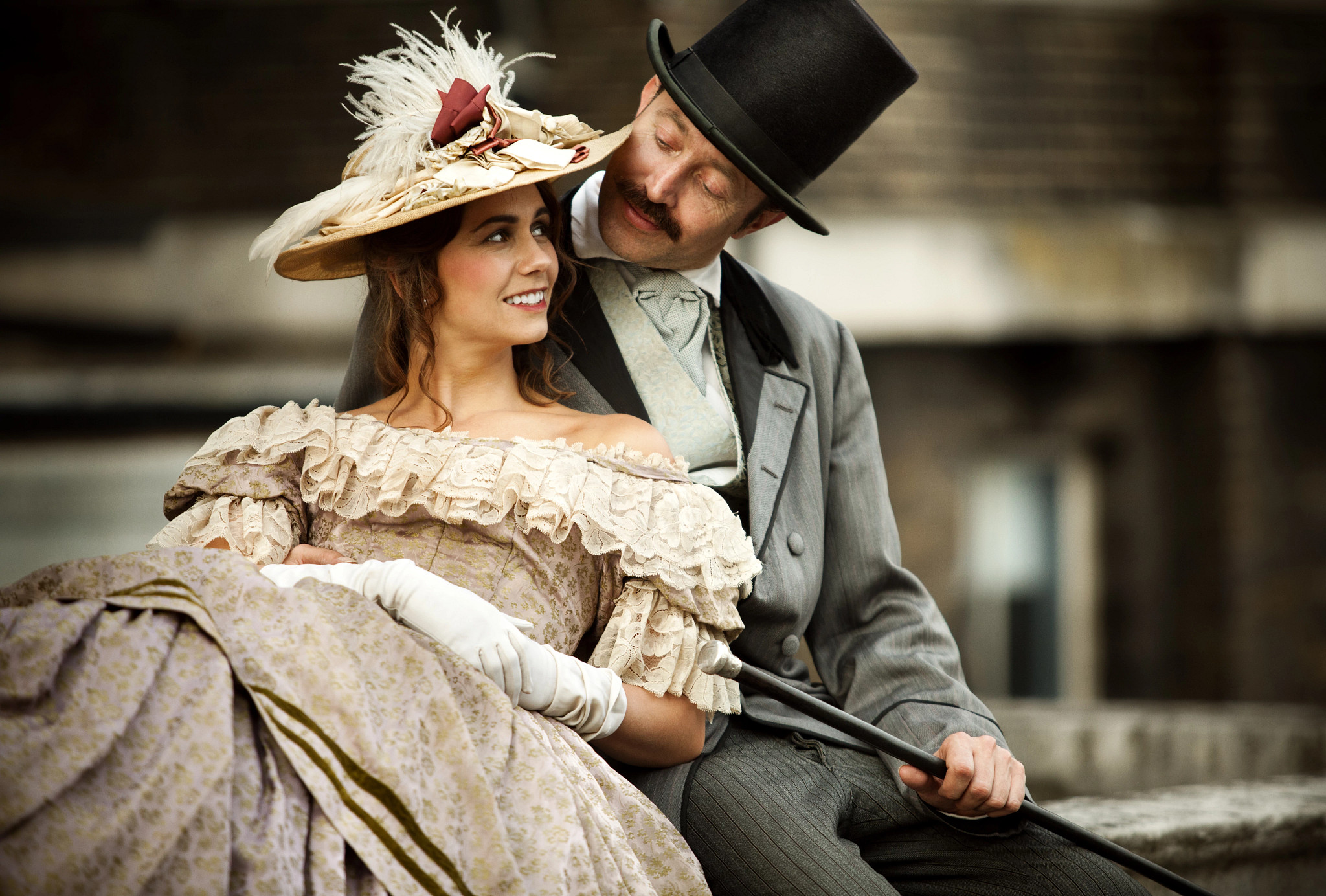 Victorian era couple look lovingly at each other