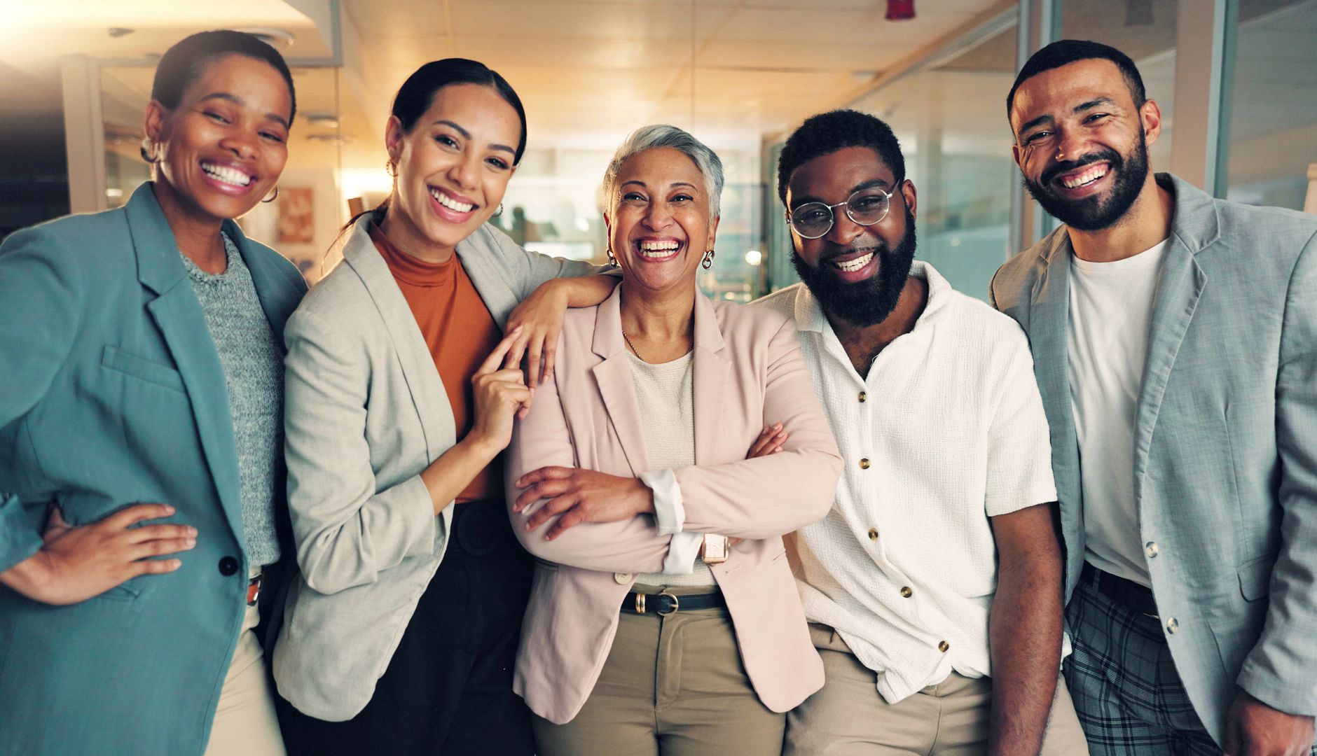 Portrait of diverse business people in office. Portrait of diverse business people in office.