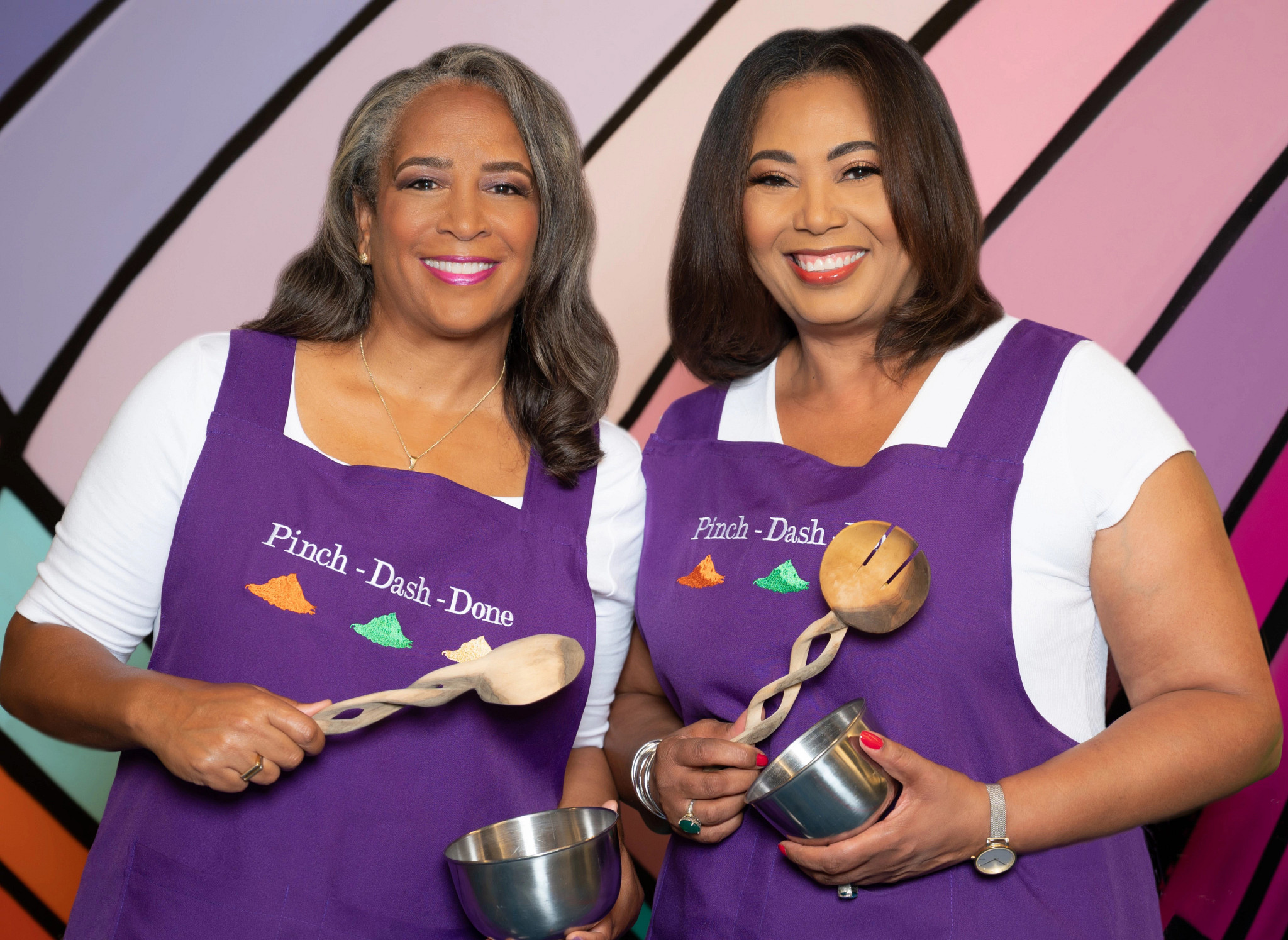 two people cooking