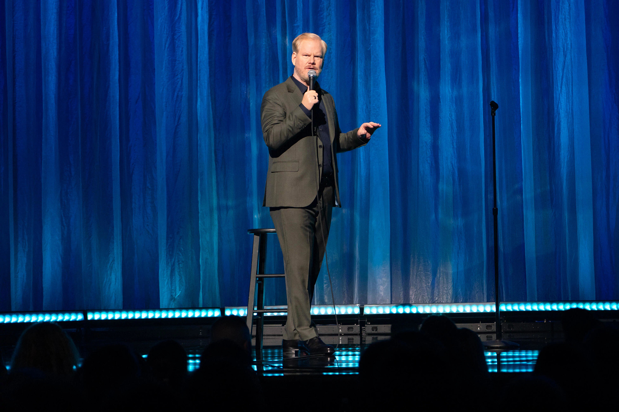 Jim Gaffigan performs onstage
