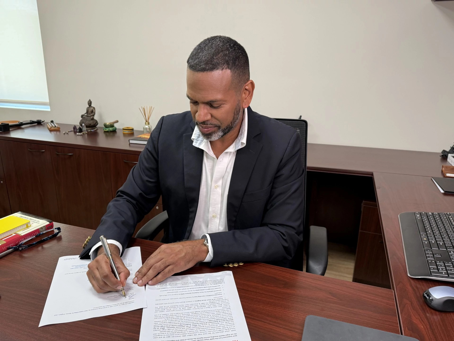 a person signing a document