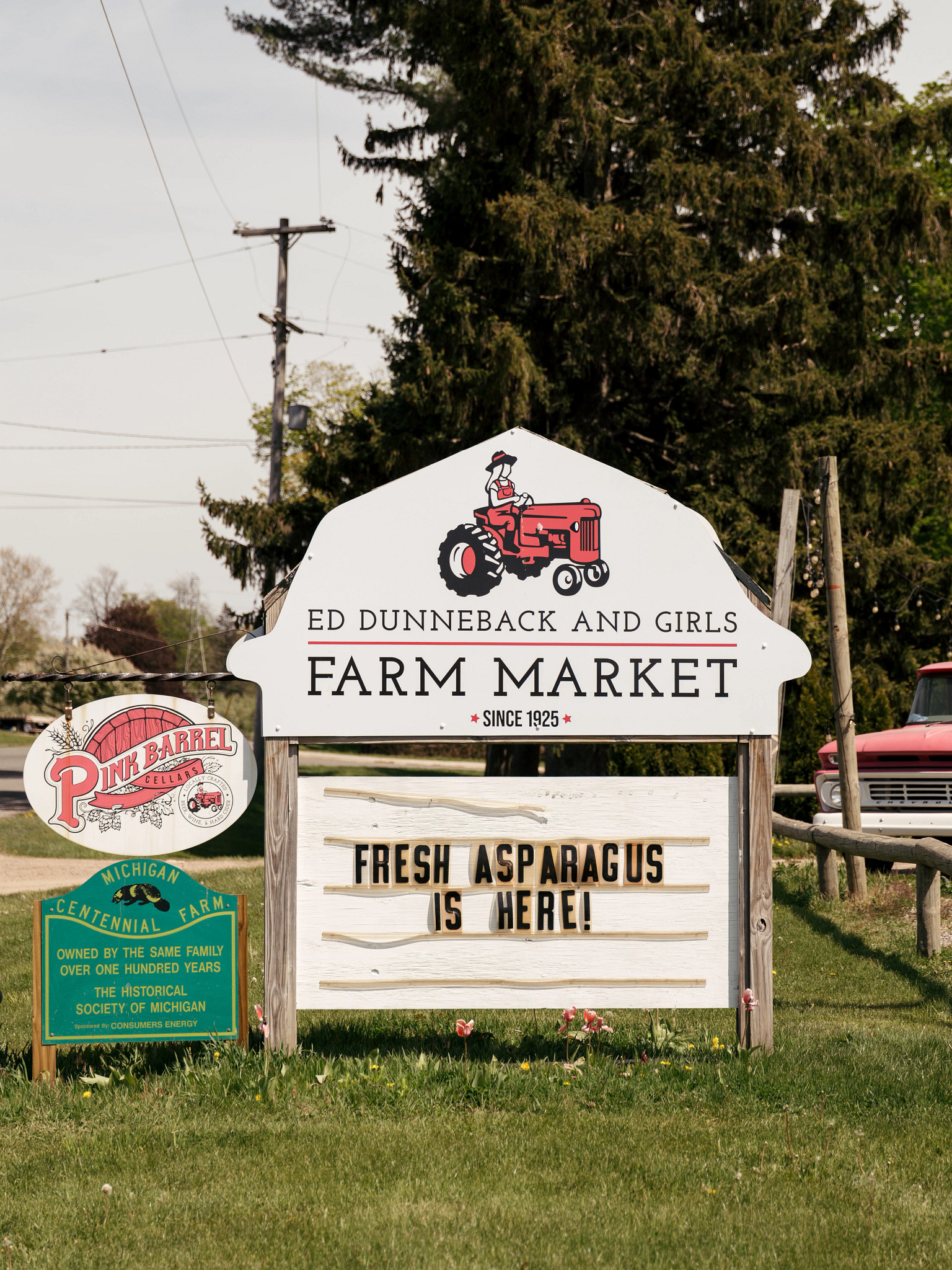 a sign outside the farm
