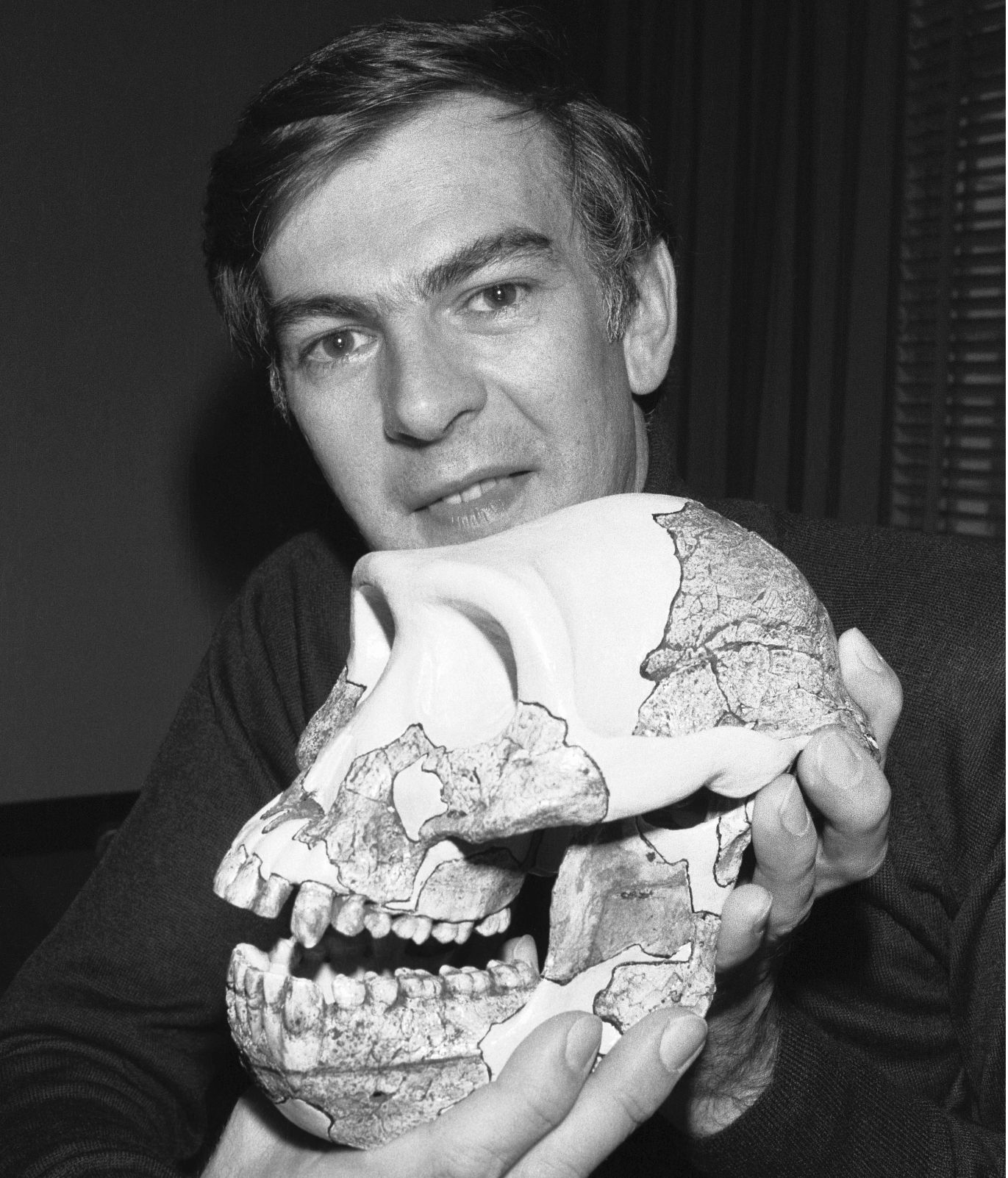 Donald Johanson holding the skull of Lucy