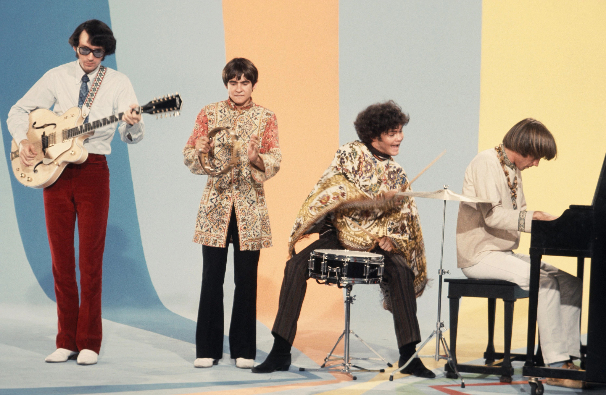 The Monkees performing together.