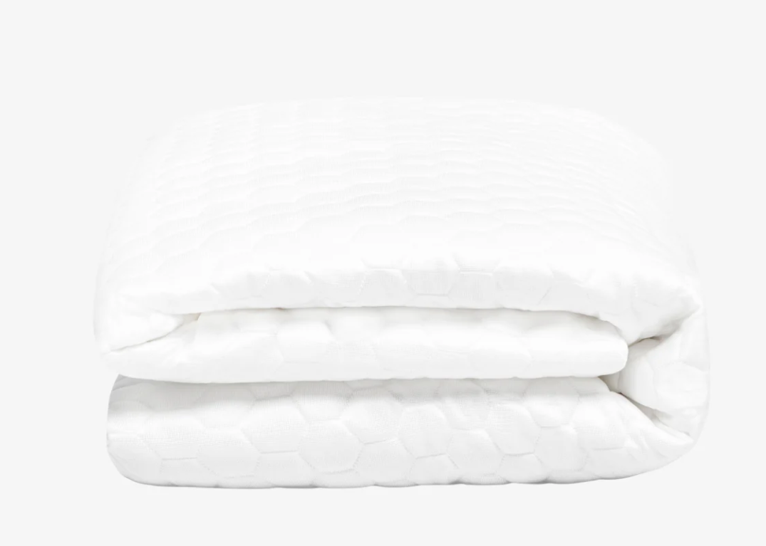 A folded Brooklyn Bedding Luxury Cooling Mattress Protector 