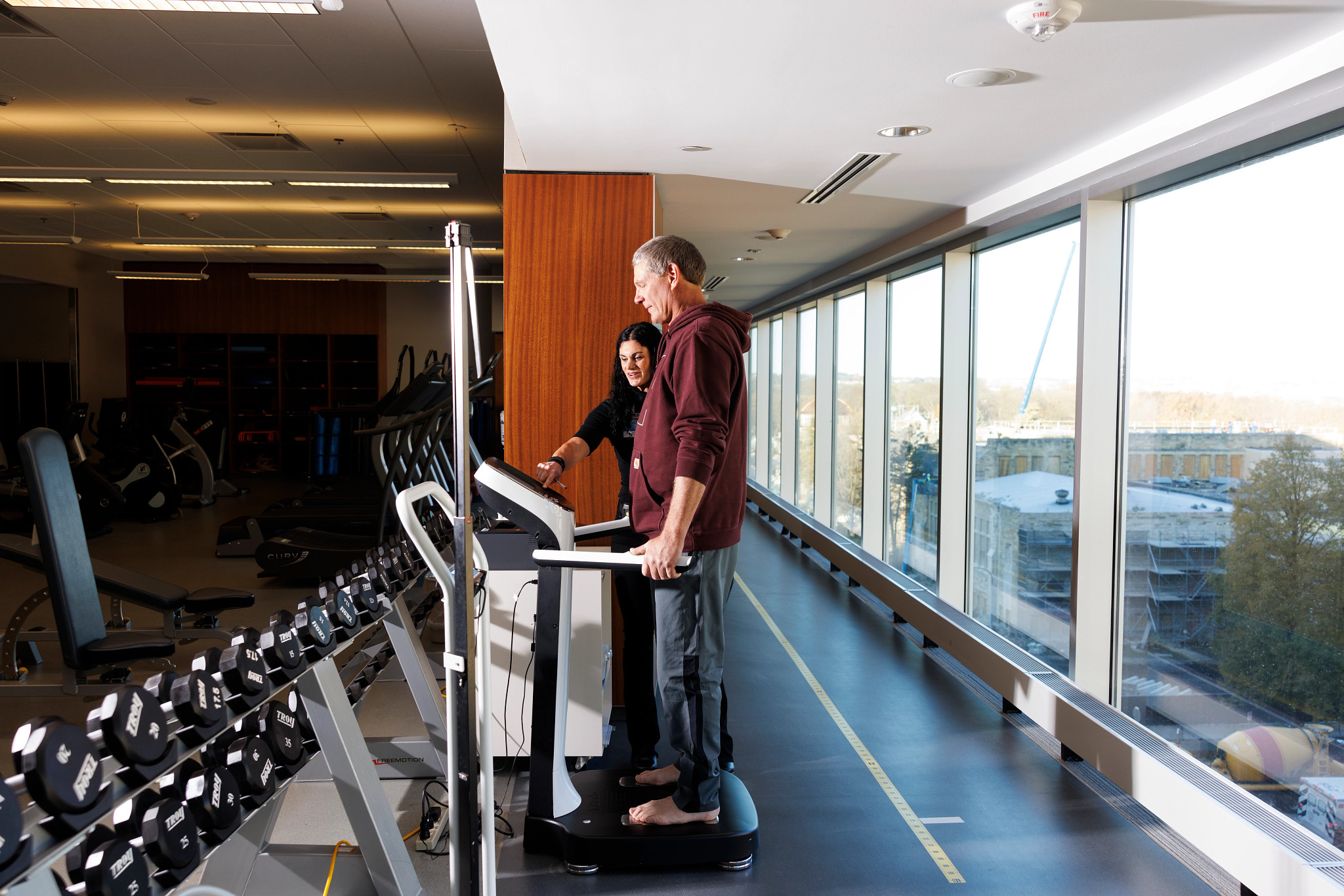 Jay Eichner stands barefoot