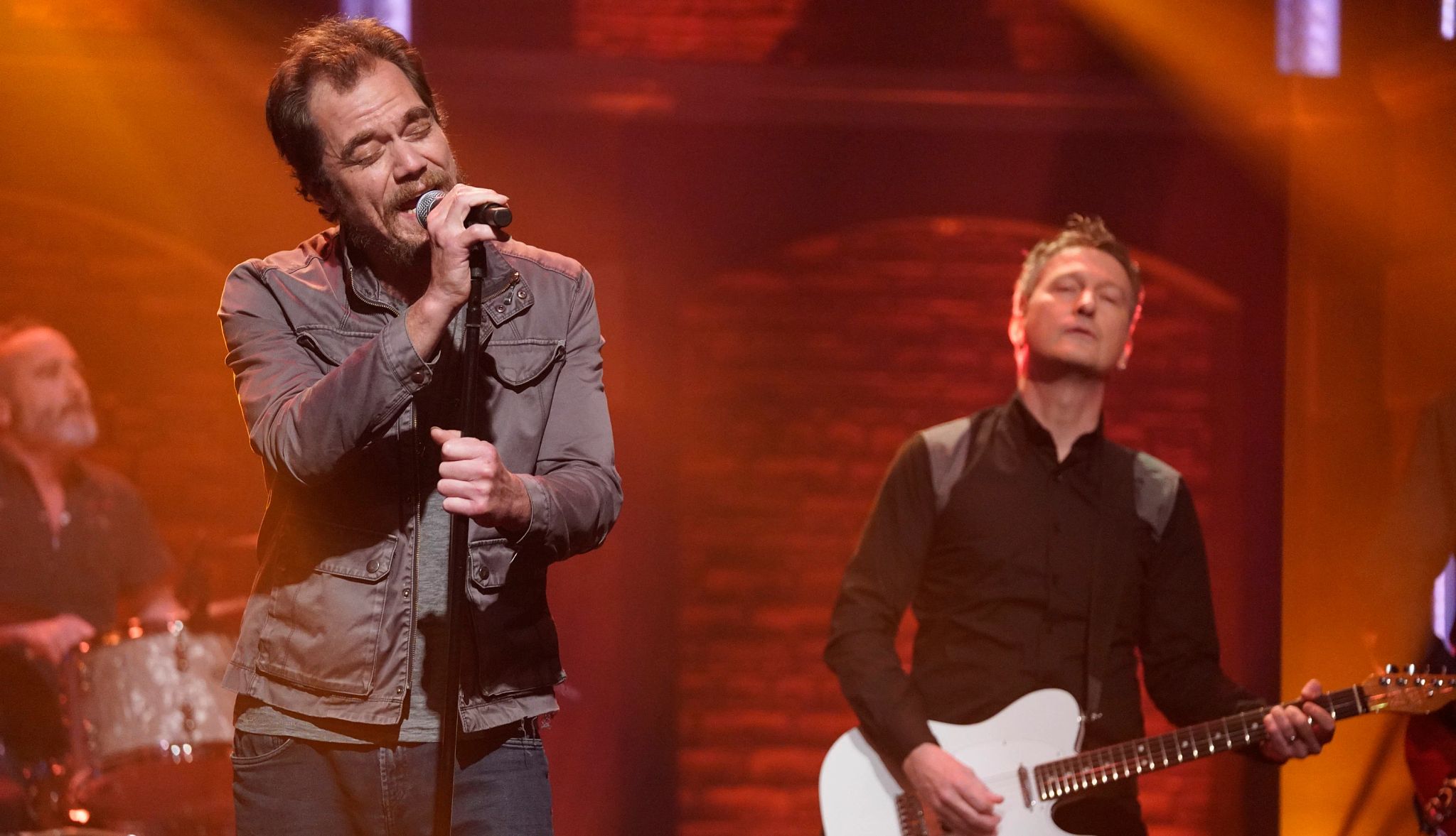 Michael Shannon and Jason Narduc to play R.E.M. Michael Shannon and Jason Narducy musicians, bathed in warm stage light, engage in a captivating performance