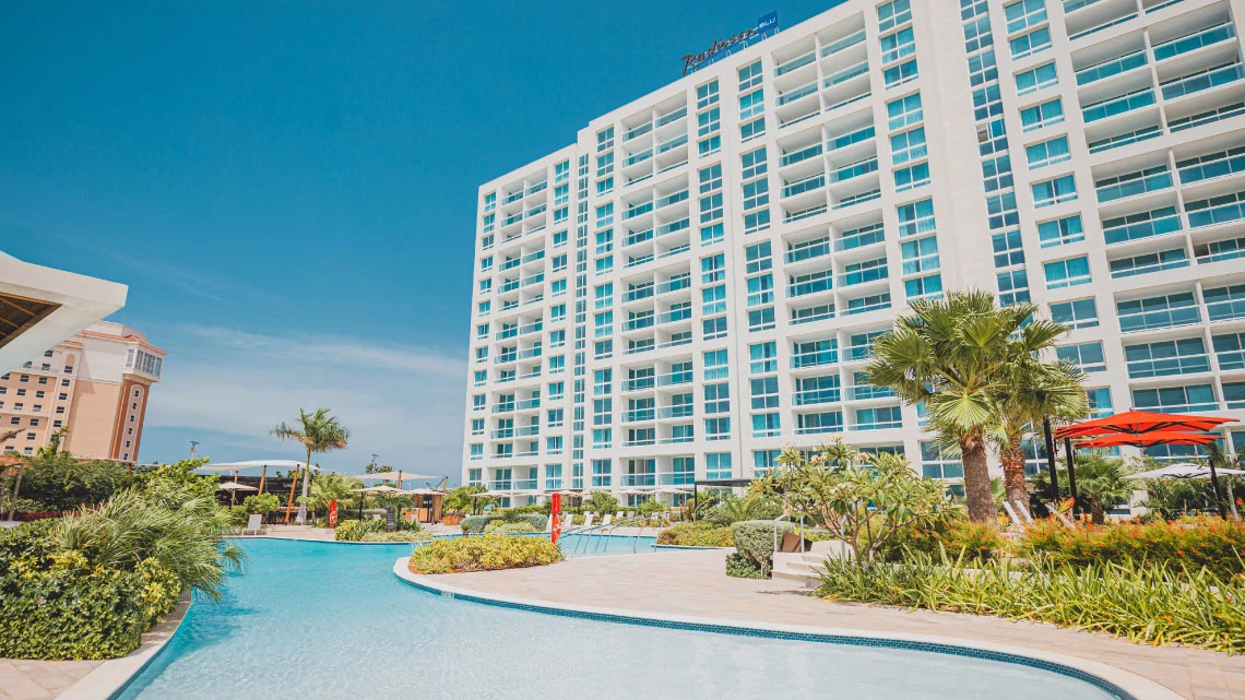 Radisson Blu® hotel exterior with pool