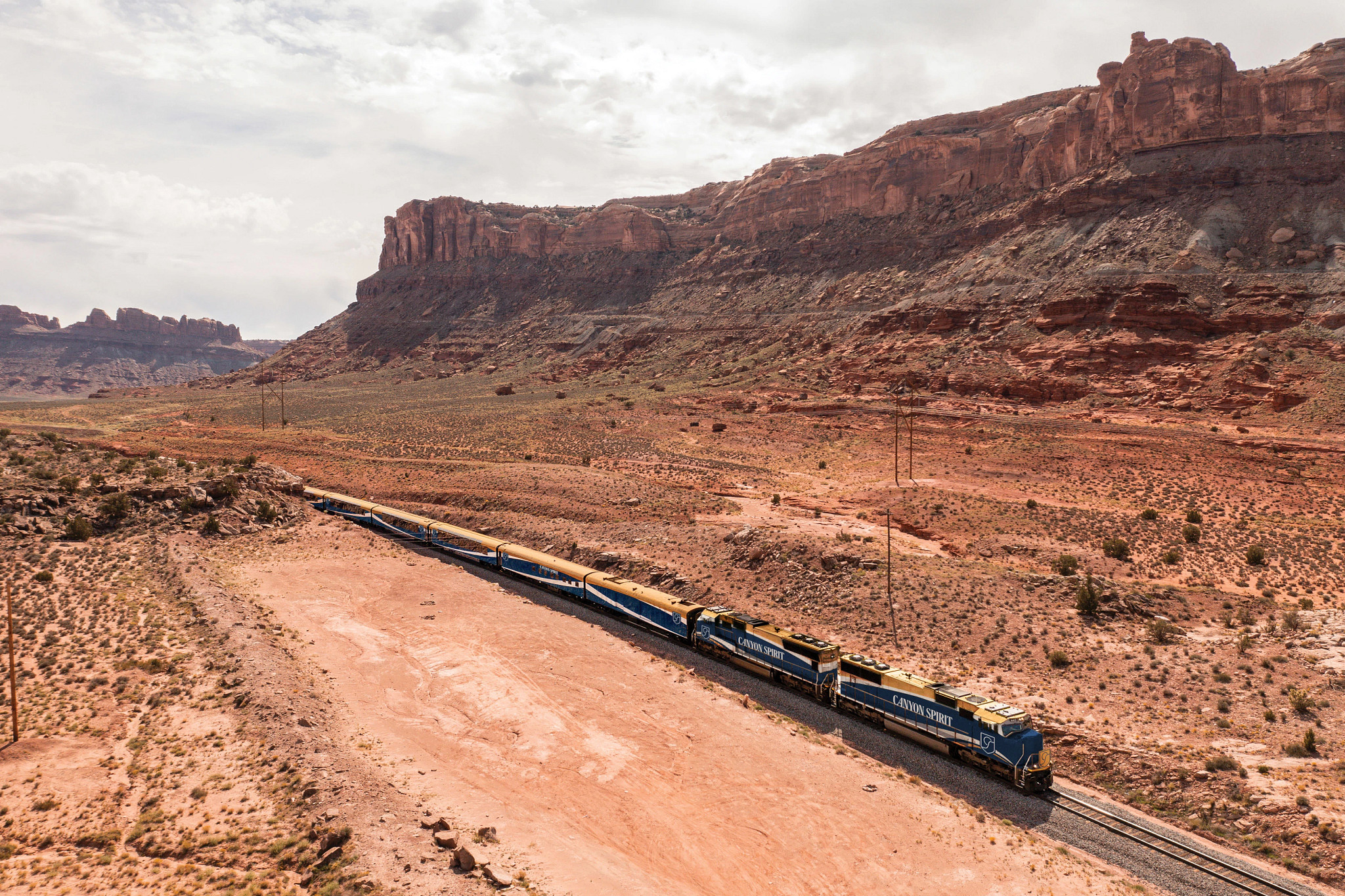 a train traveling through the desert